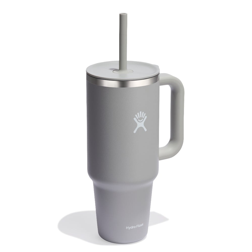 Stay refreshed on the go with the Hydro Flask 1183ml Travel Tumbler. Keeps drinks cold for hours with a leak resistant design and comfy handle.