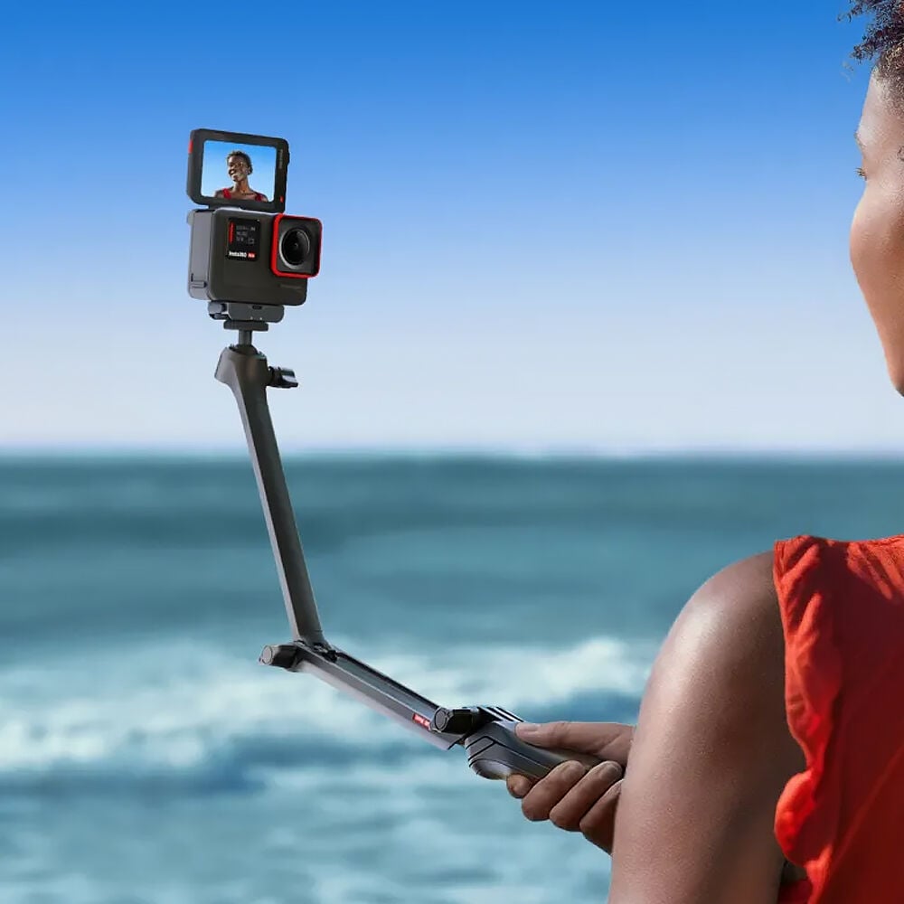 Insta360 3-in-1 Multi-Mount combines tripod, selfie stick, and magic arm in one compact design with a 3-way folding structure, adjustable length from 21 to 51 cm, fully rotatable 360° ball joint for precise camera positioning, and unique Mantis Mode for hanging the camera for creative vantage points.