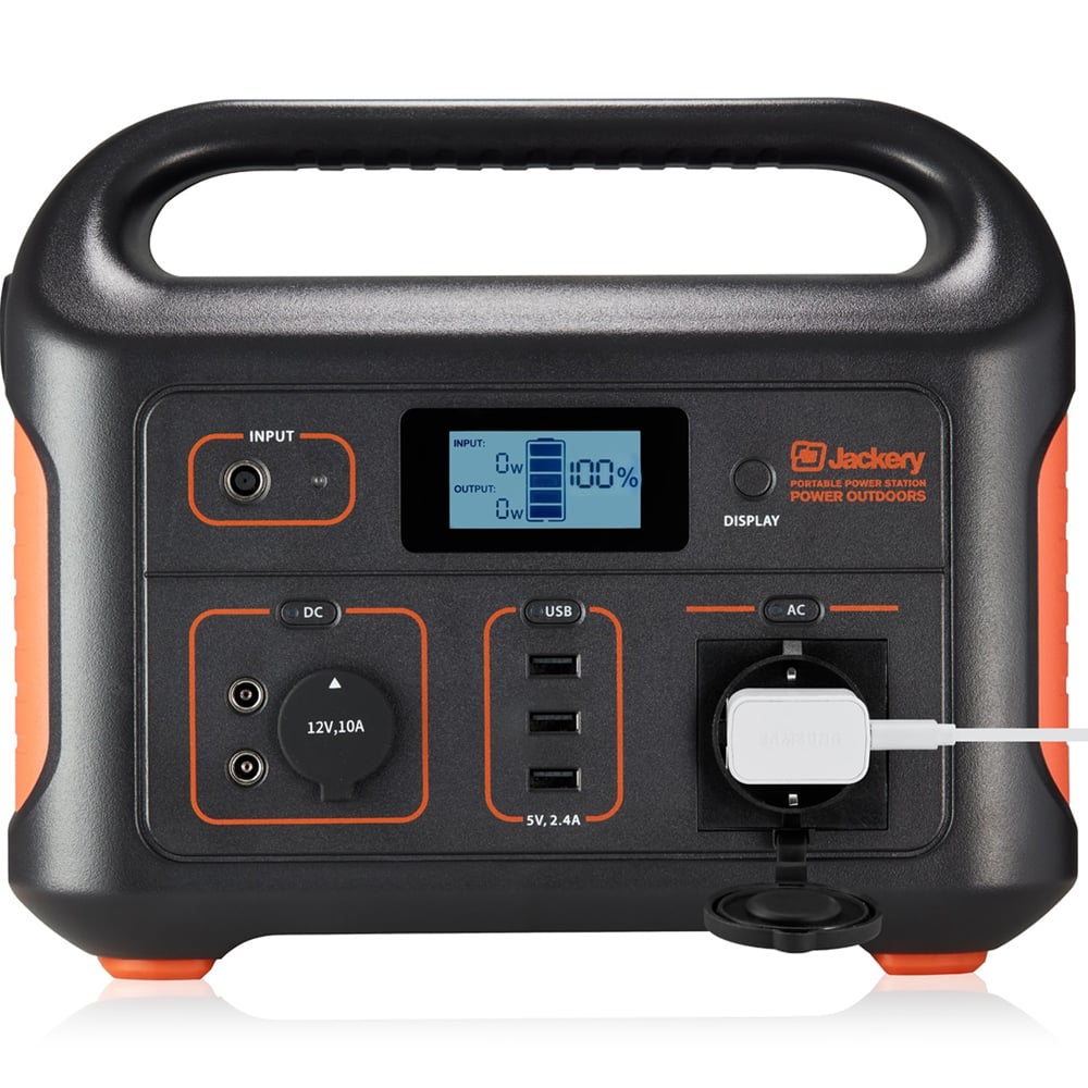 Portable Jackery Explorer 500 power station with 518Wh lithium-ion battery, 500W continuous and 1000W surge AC output, three USB ports, 12V car output, built-in LED flashlight, and LCD battery status display.