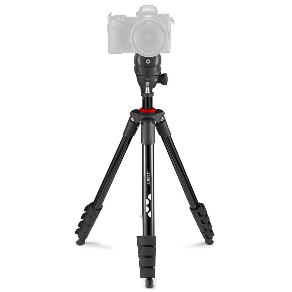 Camera on a tripod with a white background