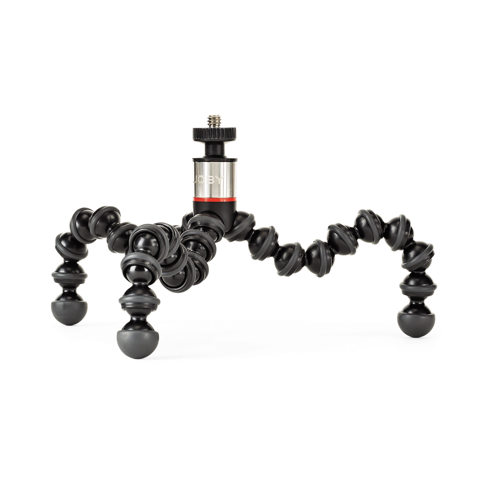 Flexible tripod stand with a camera mount on a white background