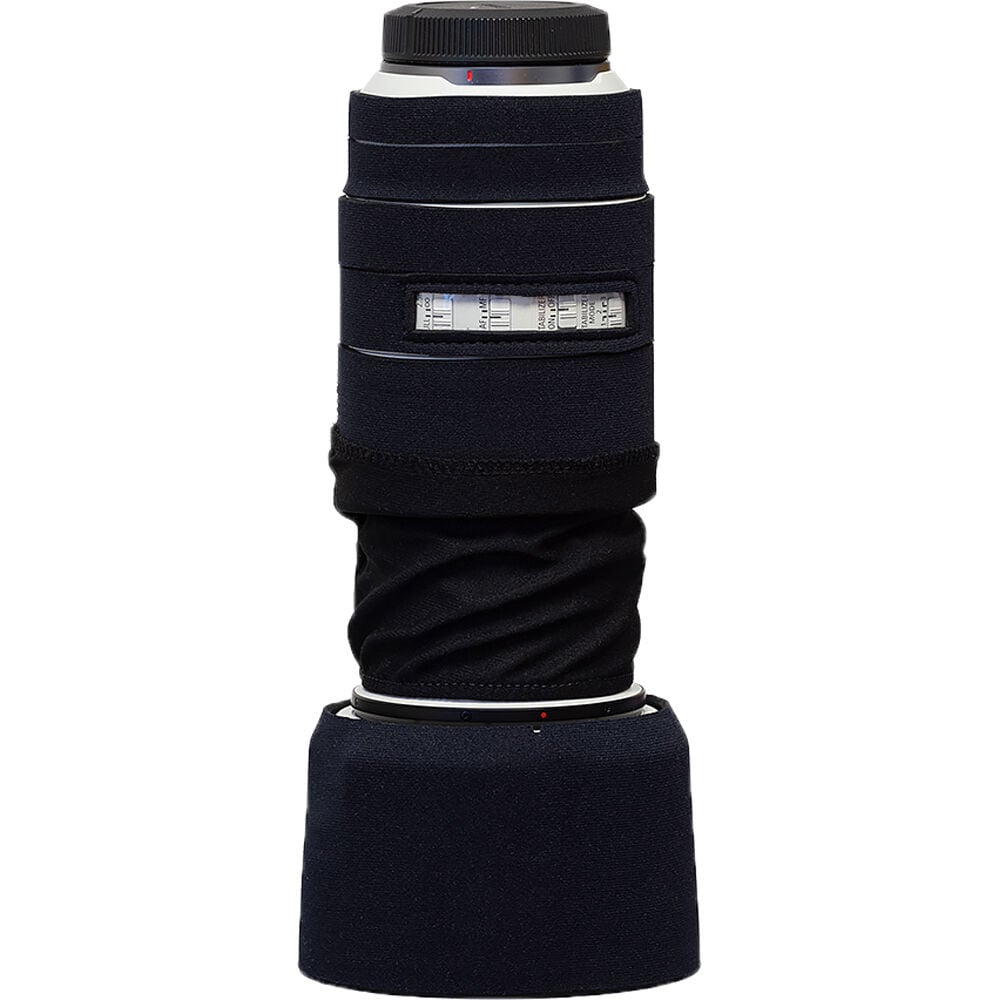 Camera lens with black neoprene sleeve on a white background