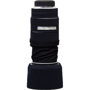 Camera lens with black neoprene sleeve on a white background
