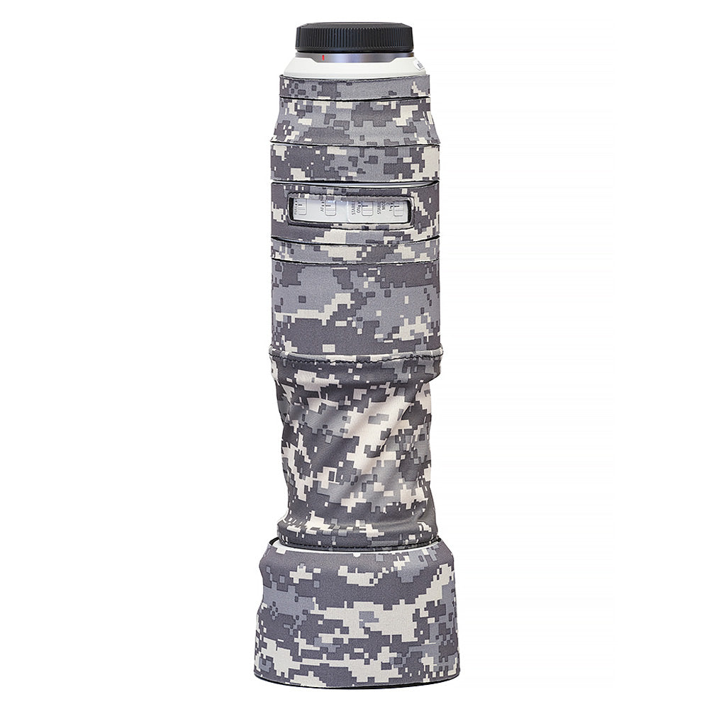 Camouflage camera lens cover on a white background