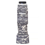 Camouflage camera lens cover on a white background