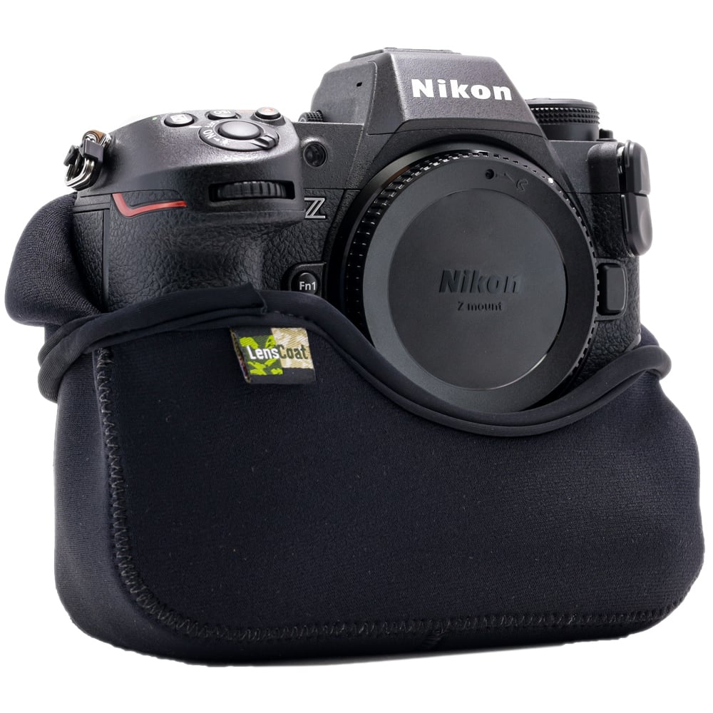 Nikon camera in a black case on a white background