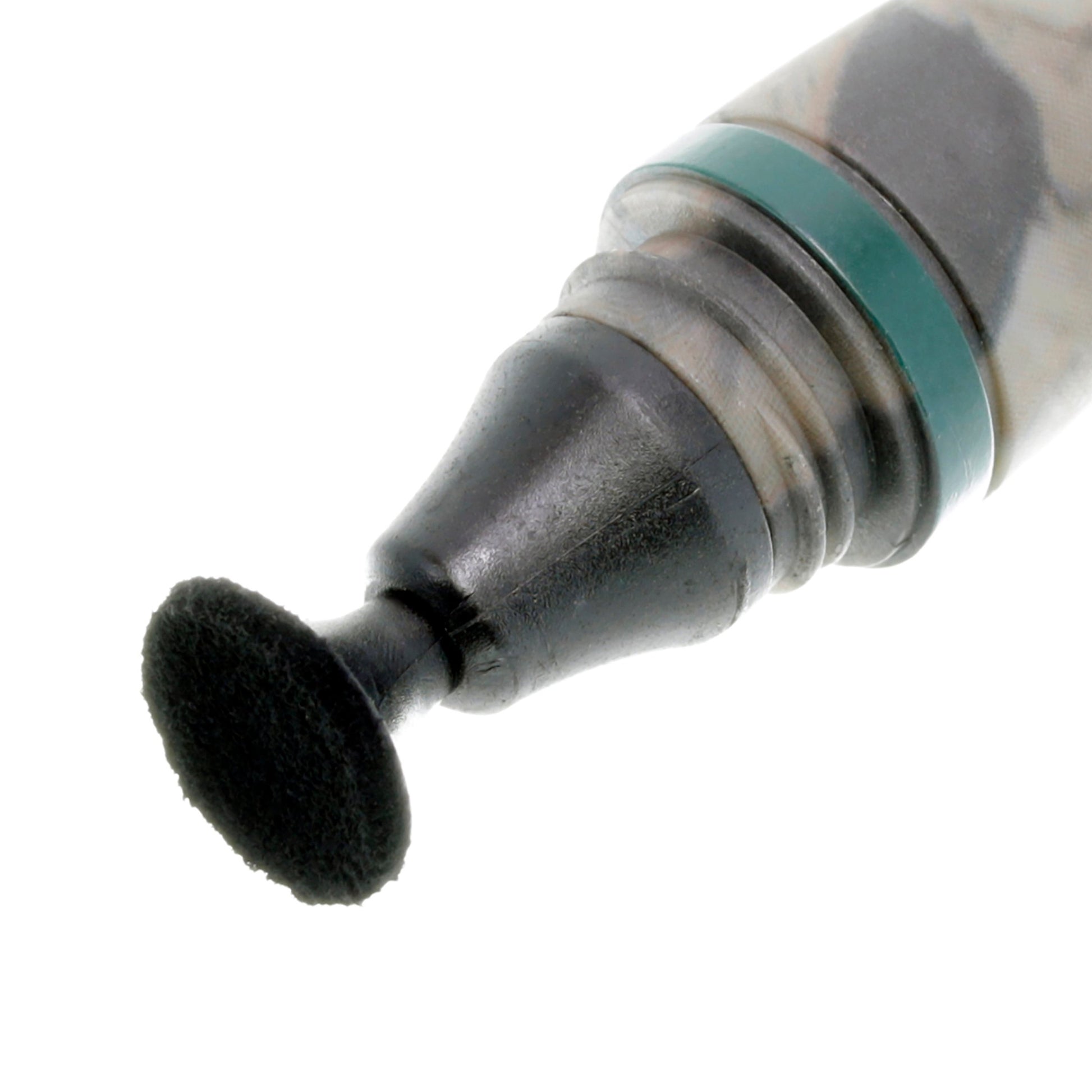 Close-up of a dental tool with a black brush head on a white background
