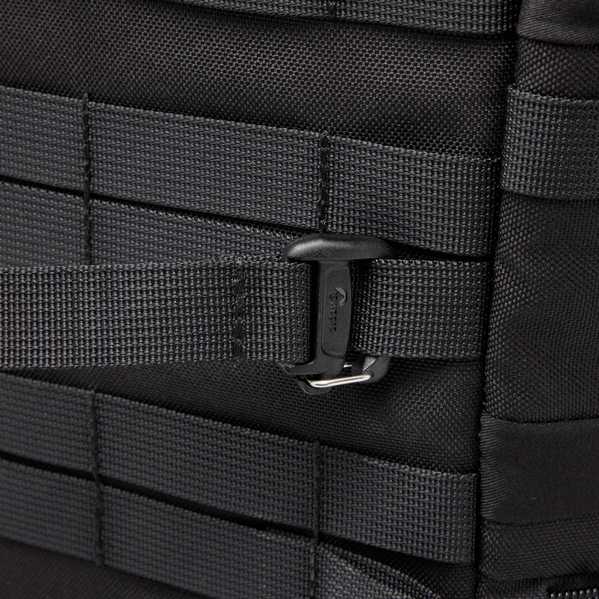 Adjustable Lowepro ProTactic Quick Straps III made of 93% recycled fabric, featuring glove-friendly cam-lock side release buckles, new custom gatekeeper hooks, compatible with 20mm webbing loops, perfect for securing tripods and accessories to camera bags.