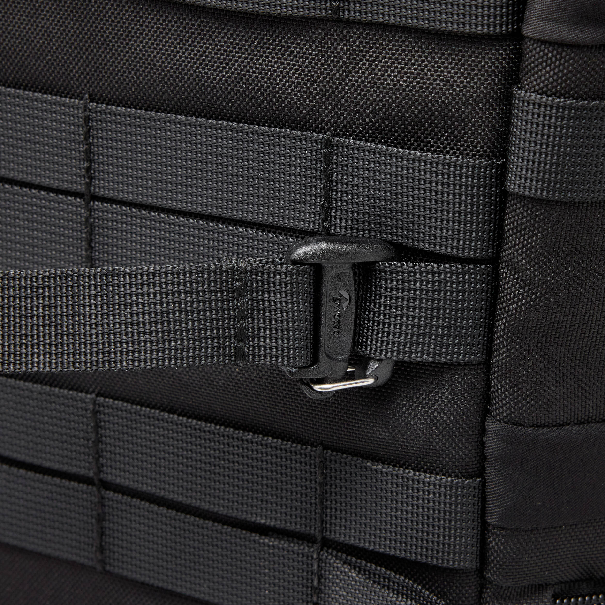 Adjustable Lowepro ProTactic Quick Straps III made of 93% recycled fabric, featuring glove-friendly cam-lock side release buckles, new custom gatekeeper hooks, compatible with 20mm webbing loops, perfect for securing tripods and accessories to camera bags.
