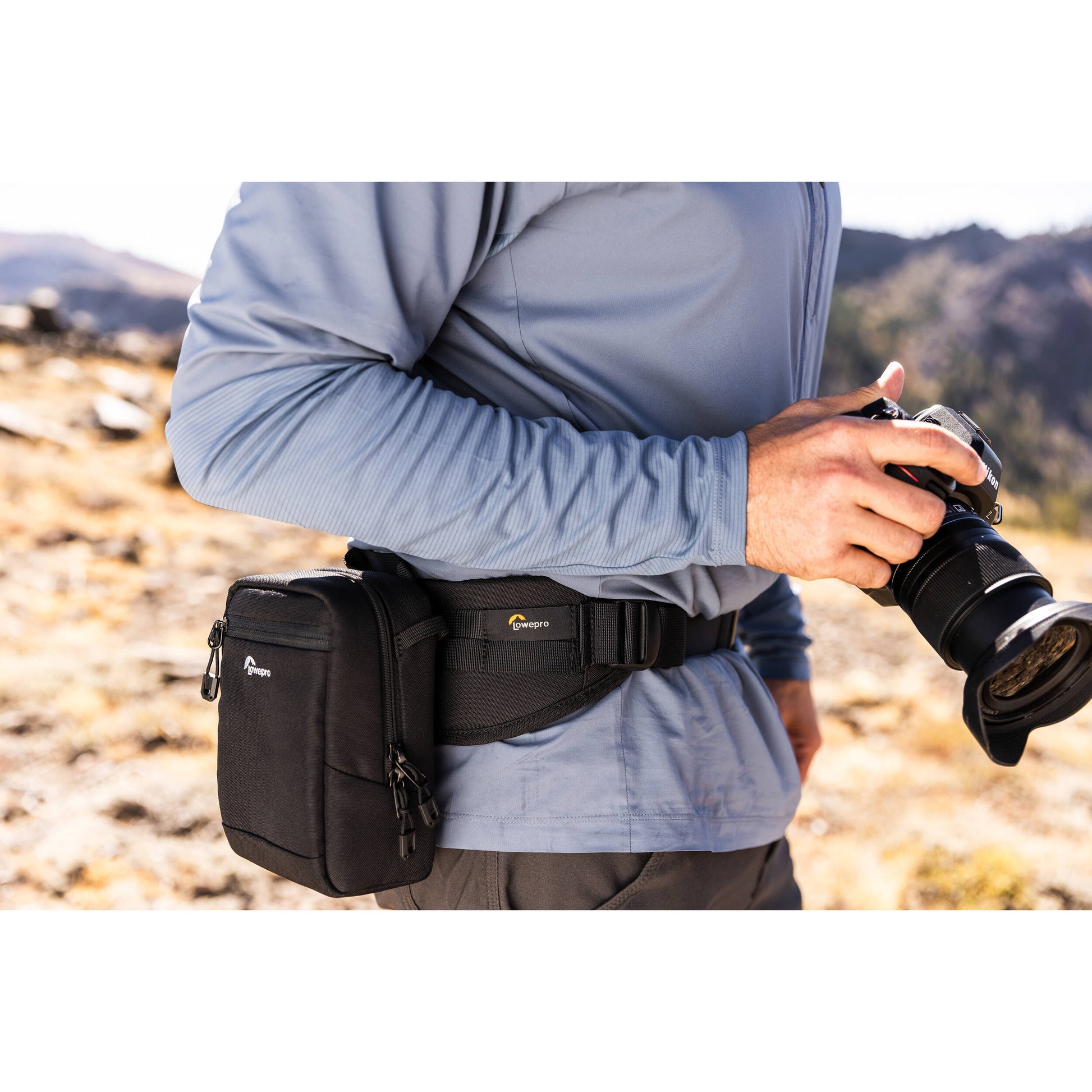 Lowepro ProTactic Utility Belt III in black, fits waists 76-148 cm, holds up to seven SlipLock pouches, includes deployable drawstring pocket for lens swaps or 1L water bottle, made with 92% recycled fabric for durability and comfort.