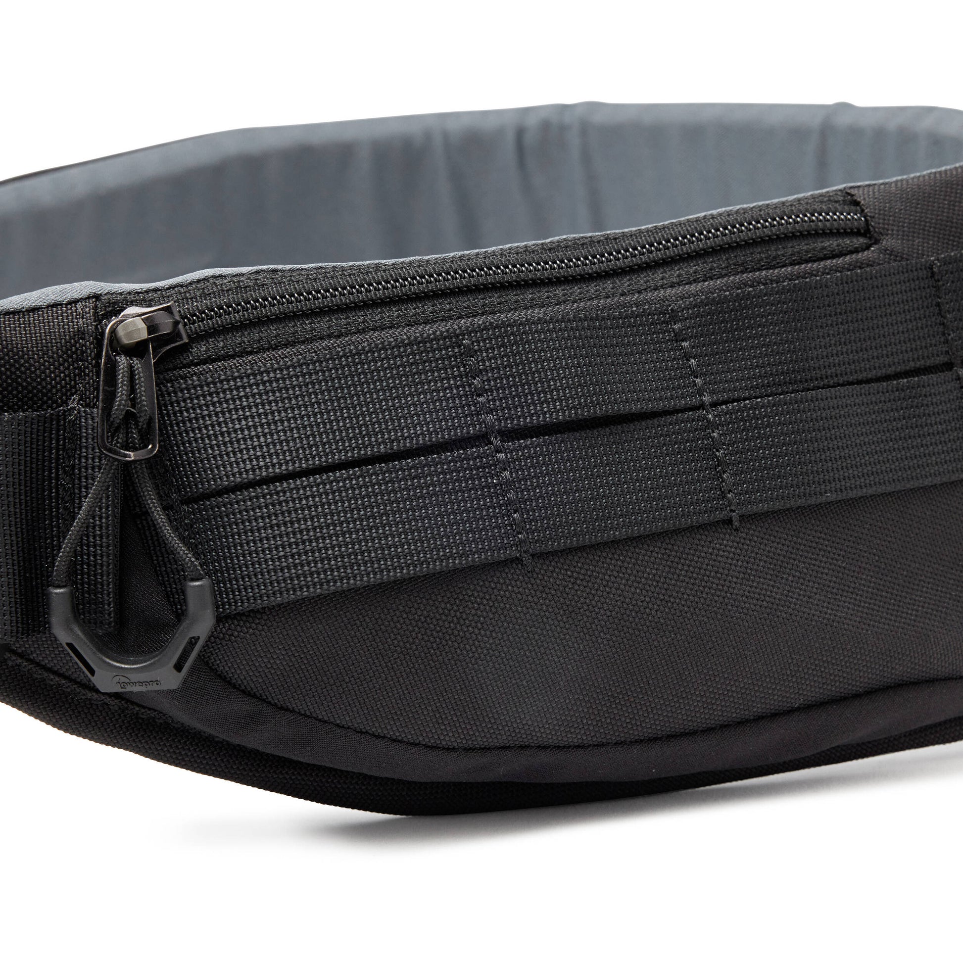 Lowepro ProTactic Utility Belt III in black, fits waists 76-148 cm, holds up to seven SlipLock pouches, includes deployable drawstring pocket for lens swaps or 1L water bottle, made with 92% recycled fabric for durability and comfort.