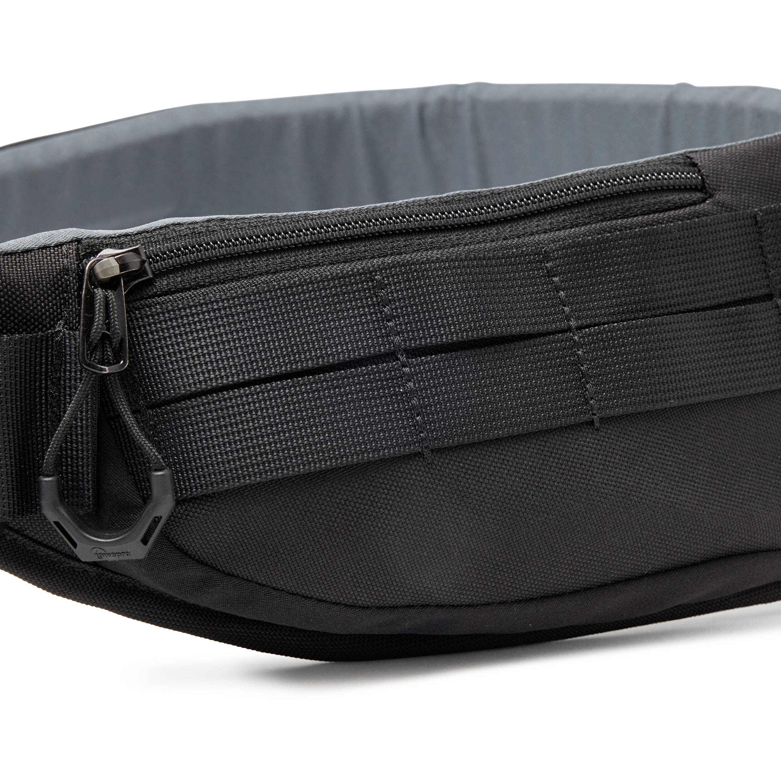 Lowepro ProTactic Utility Belt III in black, fits waists 76-148 cm, holds up to seven SlipLock pouches, includes deployable drawstring pocket for lens swaps or 1L water bottle, made with 92% recycled fabric for durability and comfort.