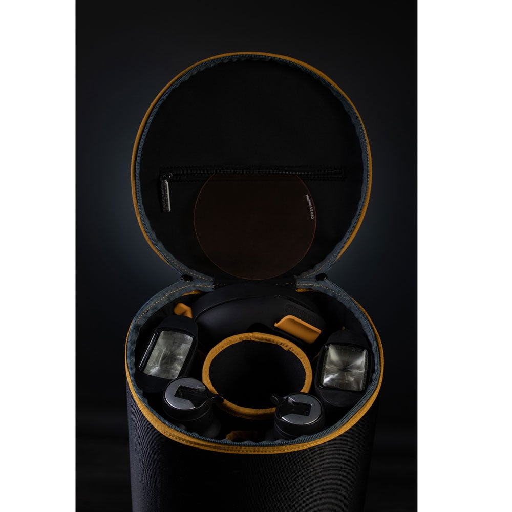 MagMod MagBox Large Case — tall cylindrical black travel case with padded sides, hard top and bottom to protect multiple MagBox softboxes and accessories.