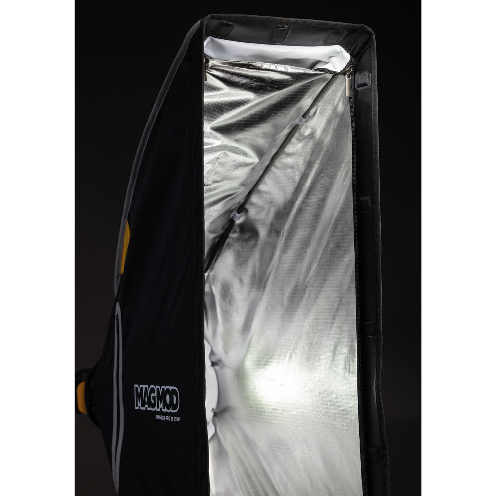 MagMod MagBox Pro 36″ Stripbox — collapsible rectangular softbox with magnetic edge and fabric diffuser.