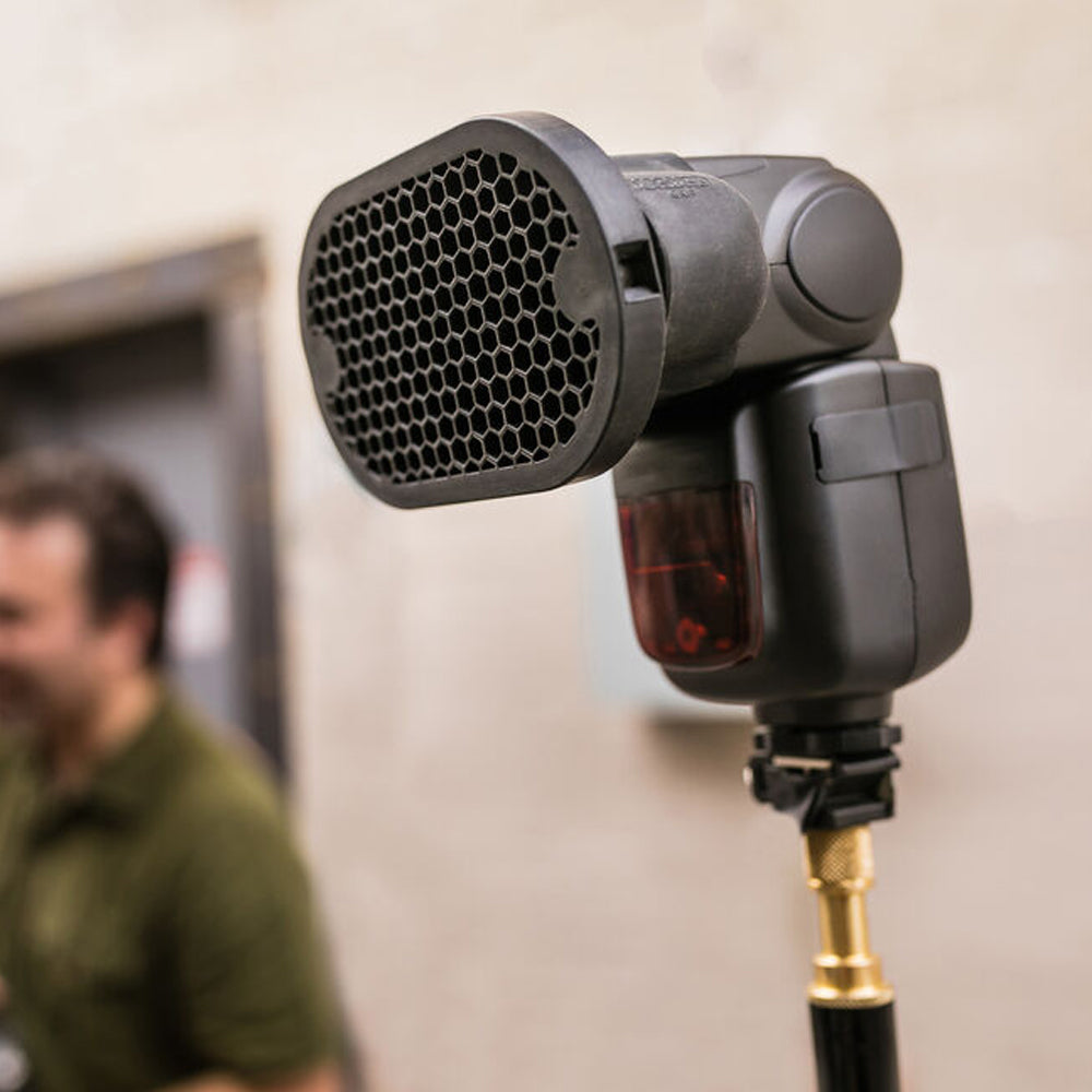 The MagMod MagGrid 2 is a professional-quality, black silicone rubber accessory with a honeycomb grid design that concentrates a flash's light beam to a 40° angle.