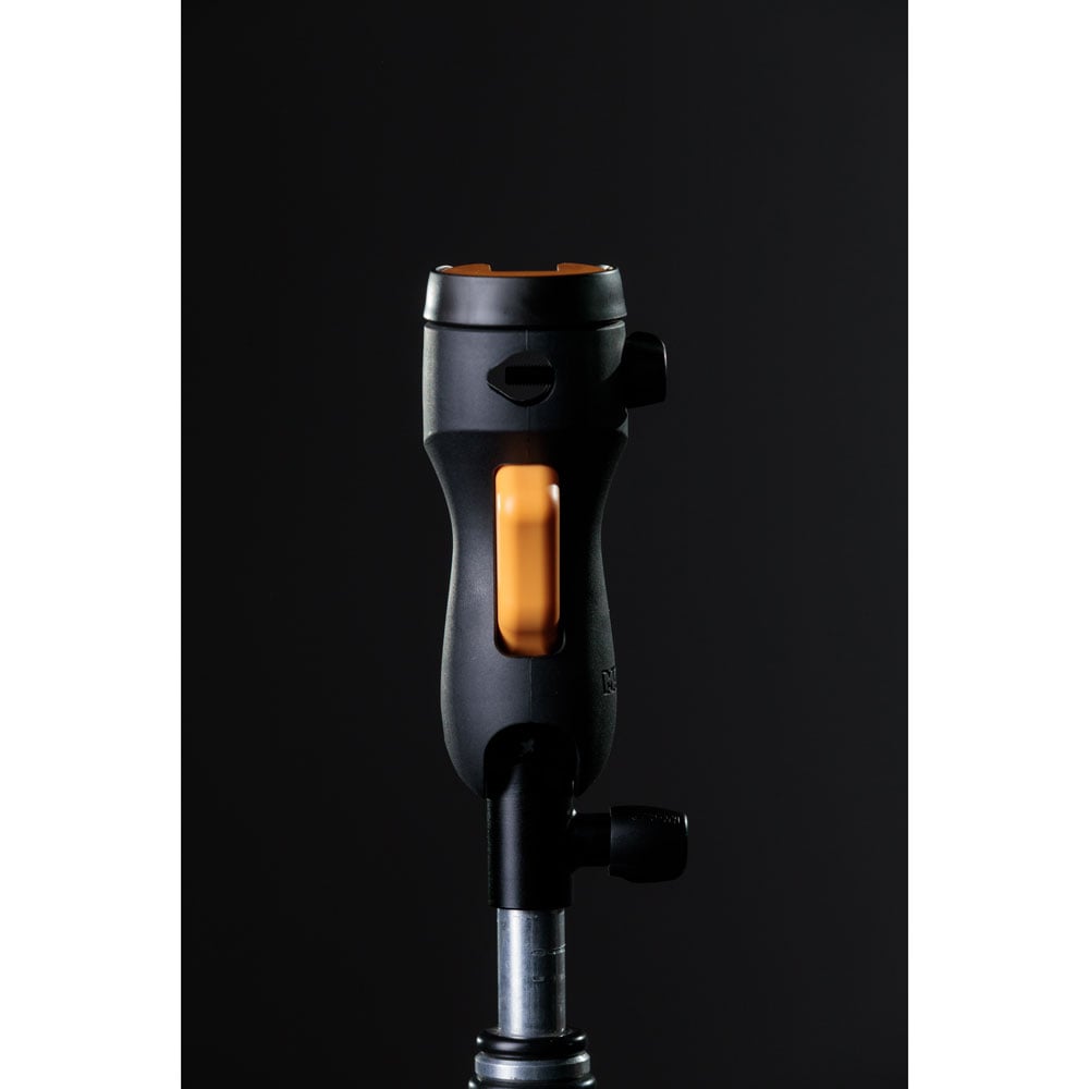 MagMod MagShoe 2 universal cold shoe bracket – ergonomic grip with orange release lever, locking mechanism for one-handed flash or modifier mounting.