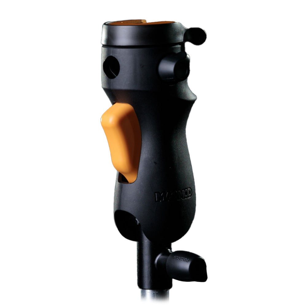 MagMod MagShoe 2 universal cold shoe bracket – ergonomic grip with orange release lever, locking mechanism for one-handed flash or modifier mounting.