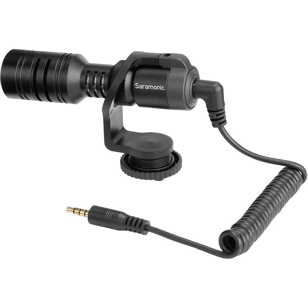 Nikon Z50 II Vlogging Kit in black featuring the Z50 II mirrorless camera body with attached NIKKOR Z 16–50 mm lens, alongside accessories including a compact vlogging LED light, shotgun microphone on cold shoe, handheld grip with wrist strap, and USB-C cable for charging.