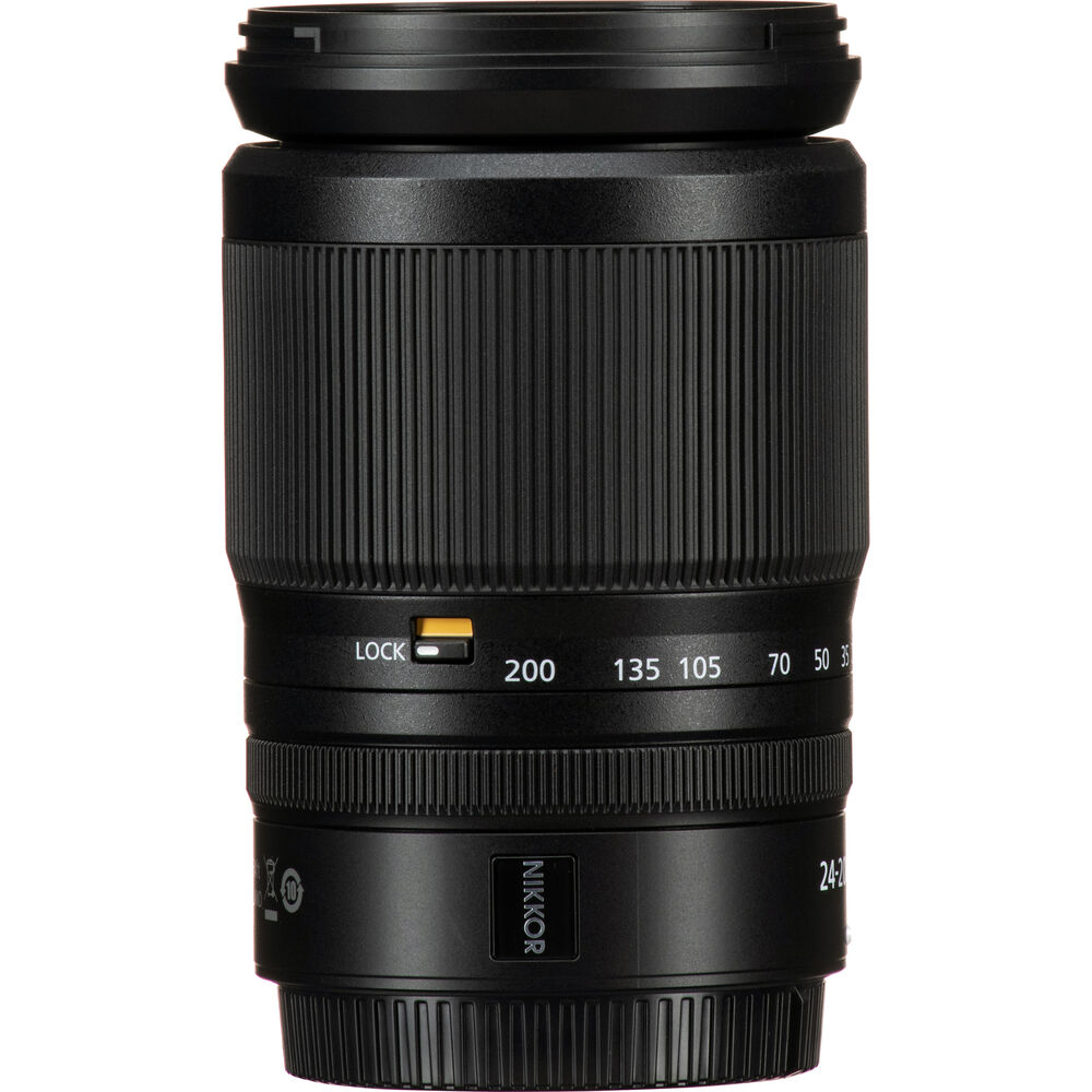 Black camera lens with focus distance markings on a white background
