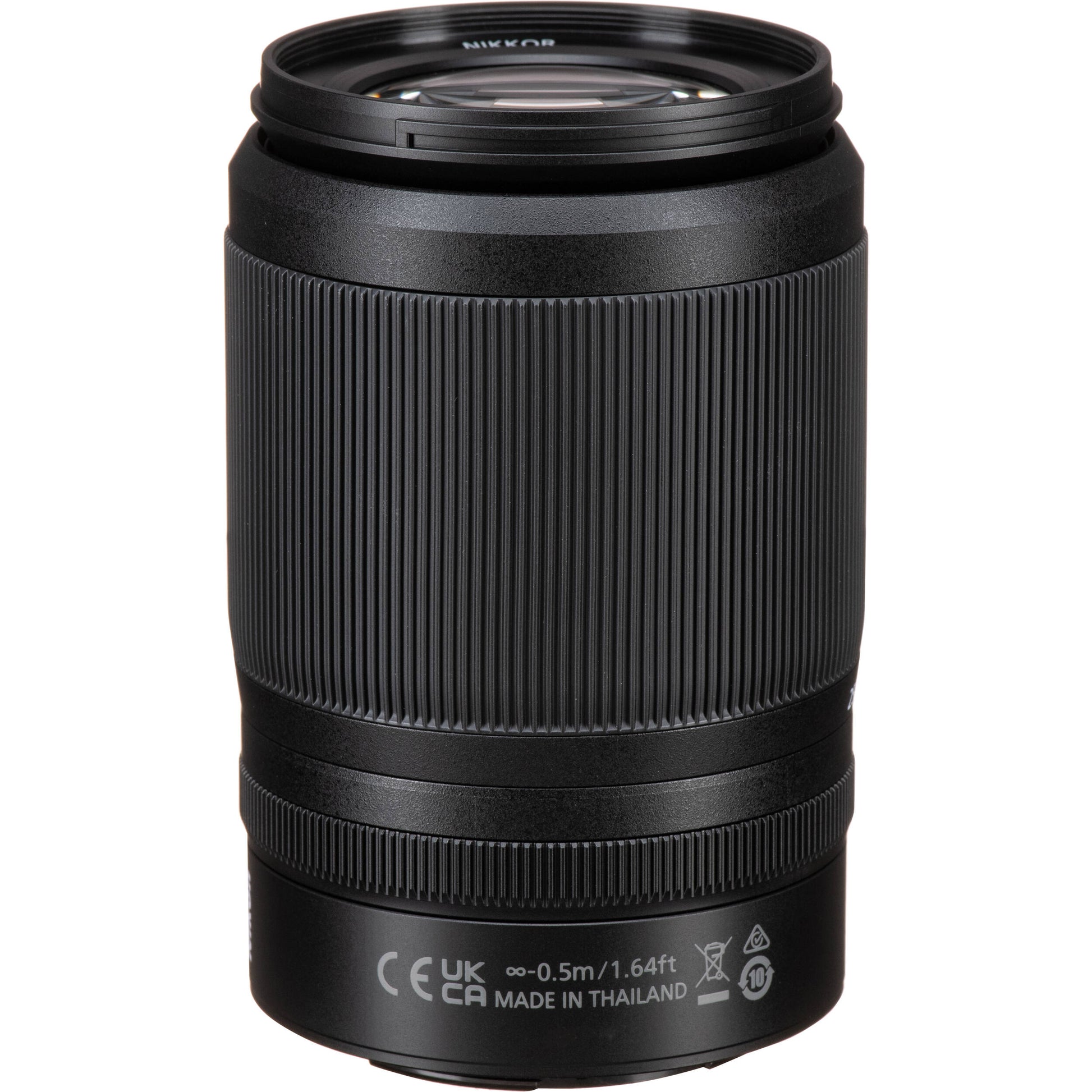 Black camera lens on a white background