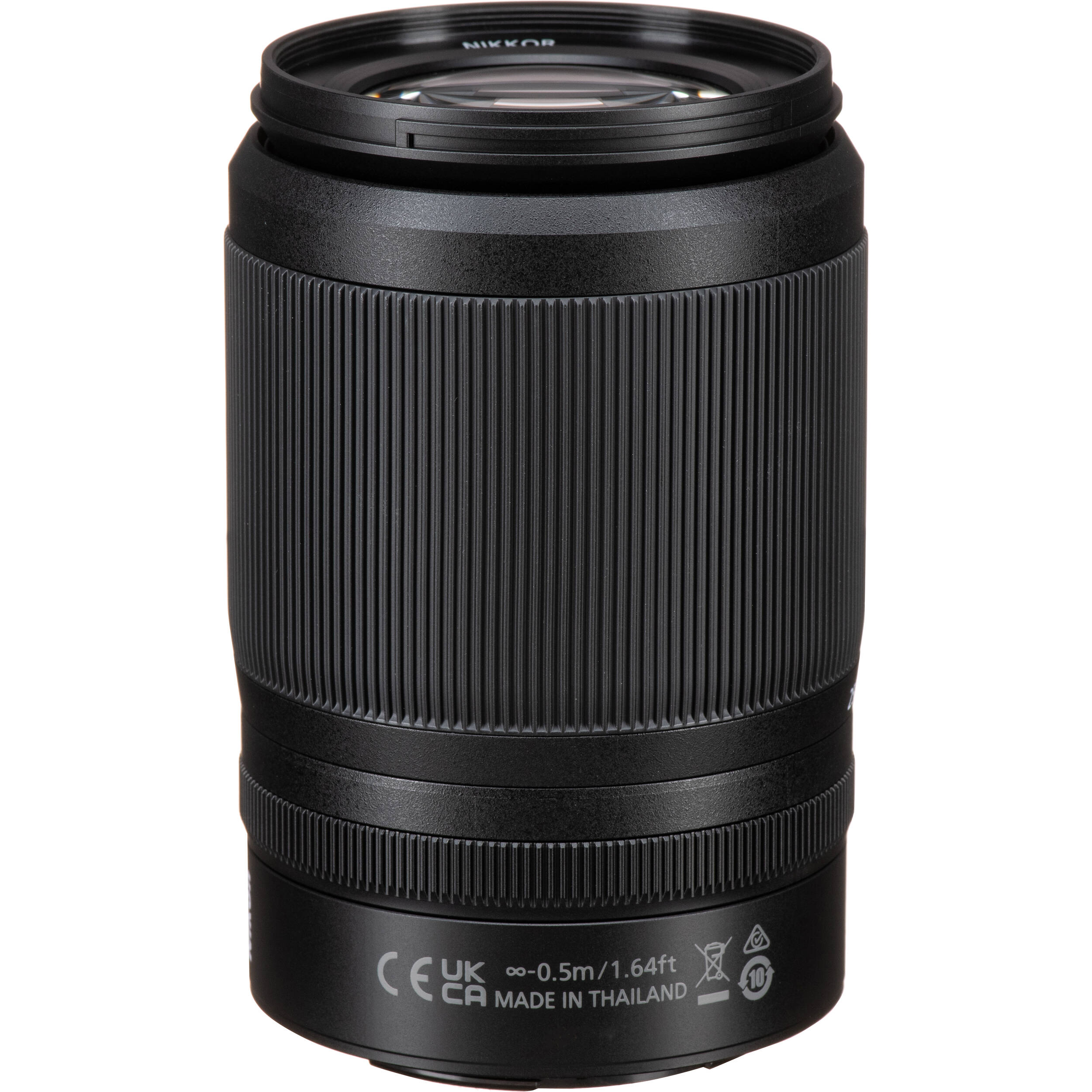 Black camera lens on a white background