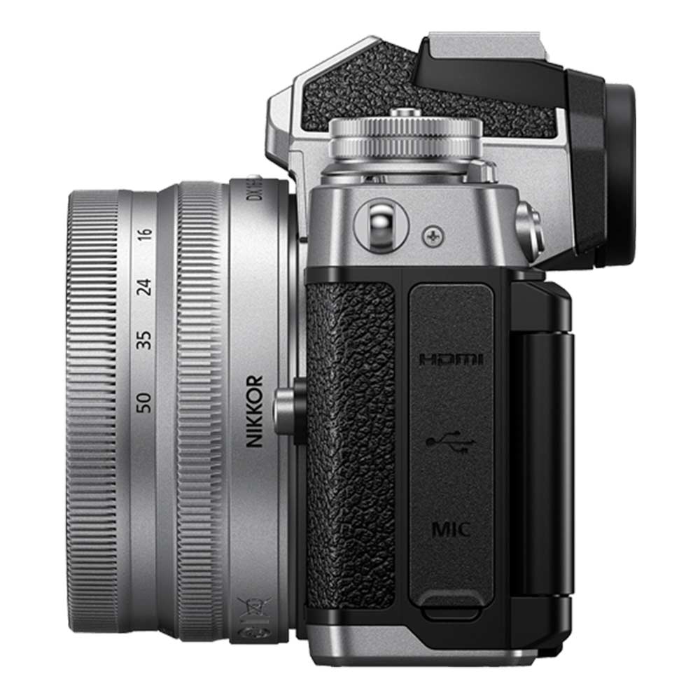 Nikon Z FC mirrorless camera with 20.9MP DX sensor and compact 16-50mm f/3.5-6.3 VR lens, 4K video, and hybrid autofocus.