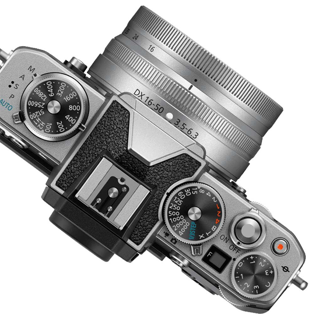 Nikon Z FC mirrorless camera with 20.9MP DX sensor and compact 16-50mm f/3.5-6.3 VR lens, 4K video, and hybrid autofocus.