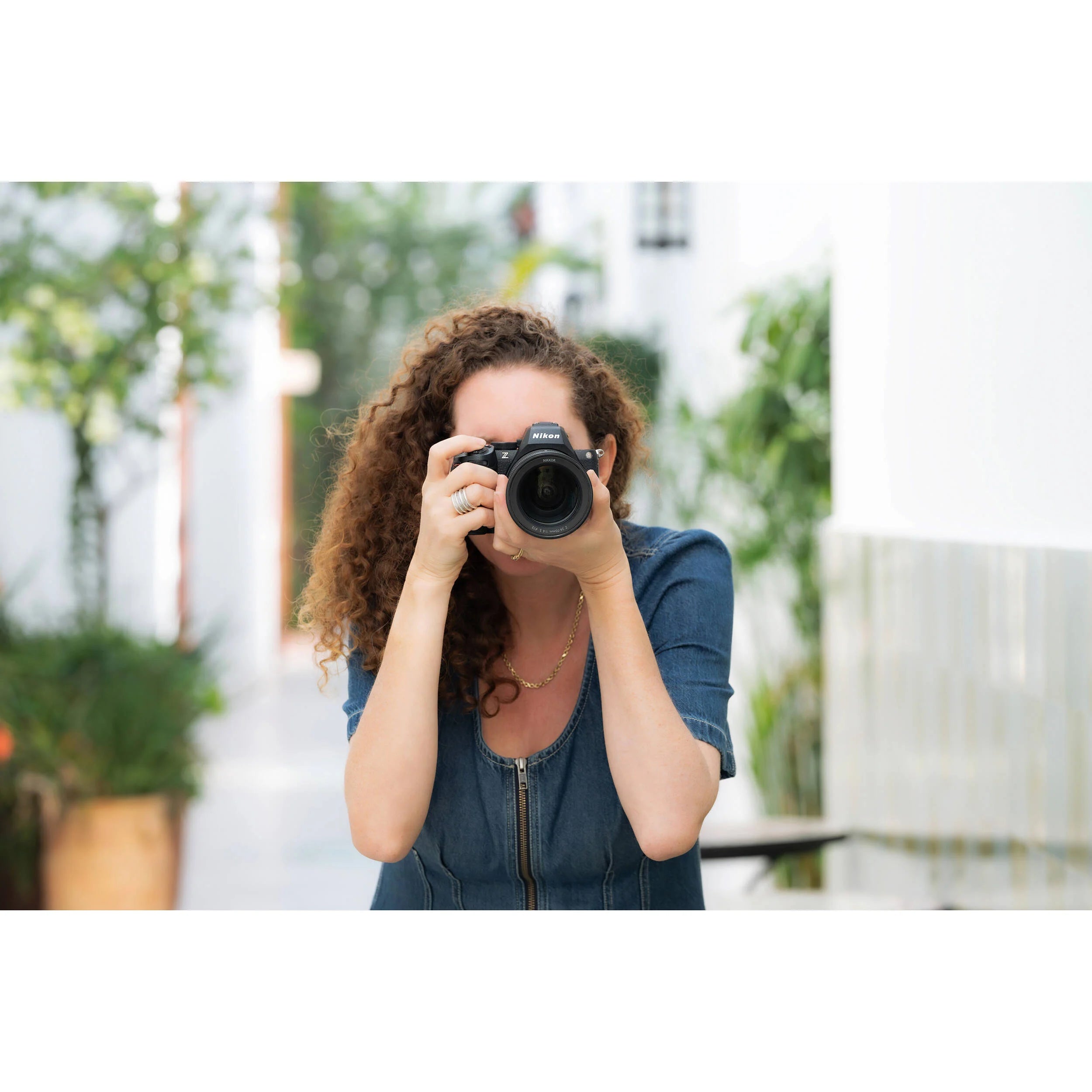 Nikon Z5 II full-frame mirrorless camera with compact retractable 24-50mm f/4-6.3 lens, 24.5MP sensor, EXPEED 7 processor, and 4K video.