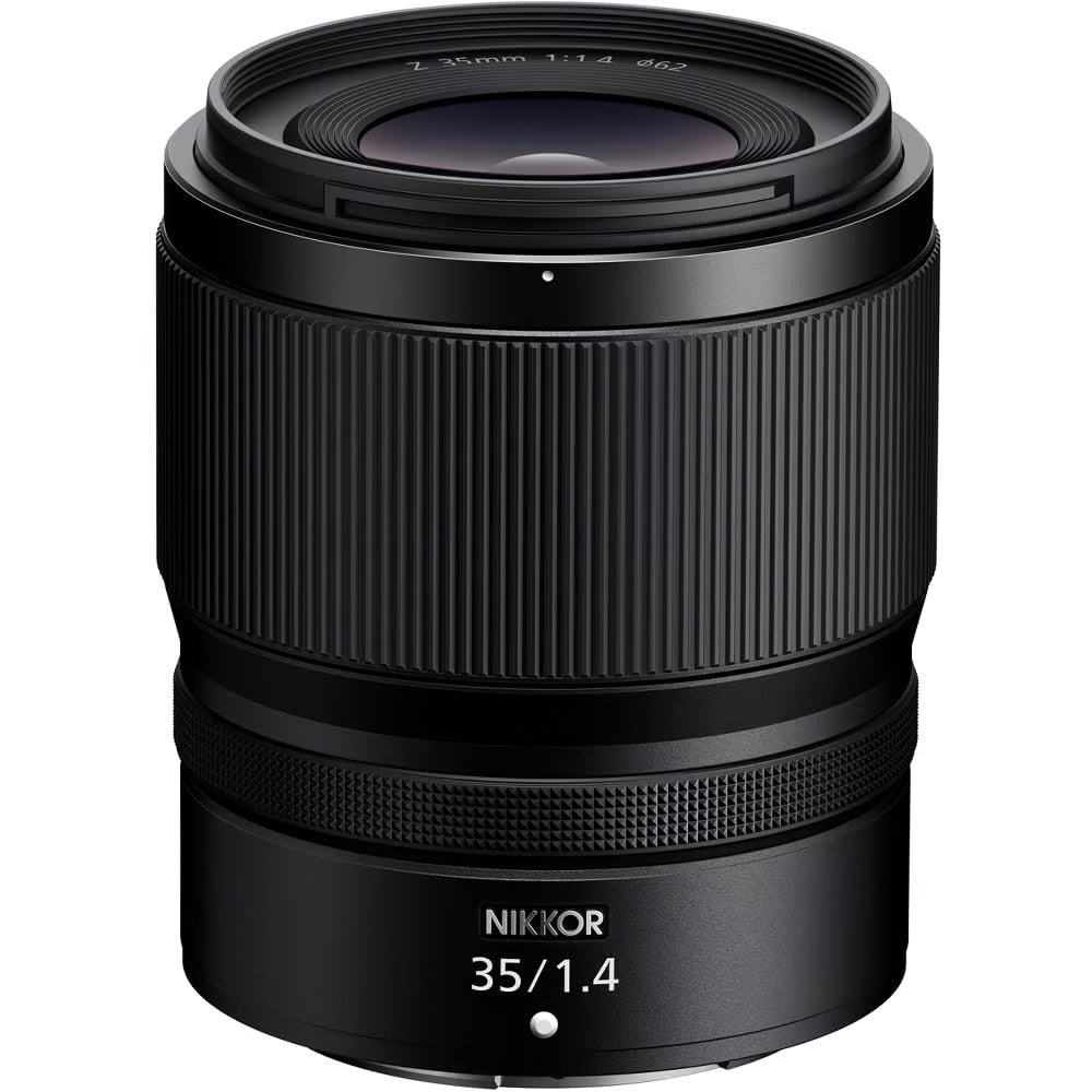 Nikon Z50 II mirrorless camera kit in black with three attached NIKKOR Z lenses (16–50 mm, 50–250 mm, and 35 mm prime), featuring a 3.2‑inch tilting touchscreen, built-in electronic viewfinder, and ergonomic textured grip.