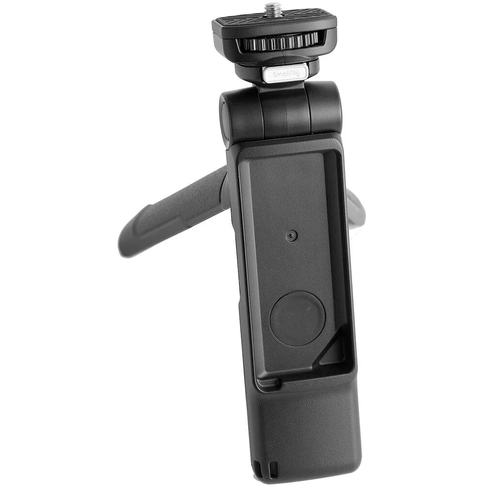Nikon Z50 II Vlogging Kit in black featuring the Z50 II mirrorless camera body with attached NIKKOR Z 16–50 mm lens, alongside accessories including a compact vlogging LED light, shotgun microphone on cold shoe, handheld grip with wrist strap, and USB-C cable for charging.