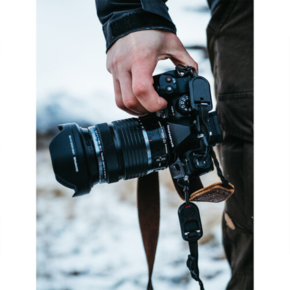 OM System OM-1 mirrorless camera with 20MP stacked BSI Live MOS sensor, TruePic X processor, 5-axis IBIS delivering up to 8 stops, 120fps EVF, 4K 60p video, and rugged IP53 weather-sealed body.