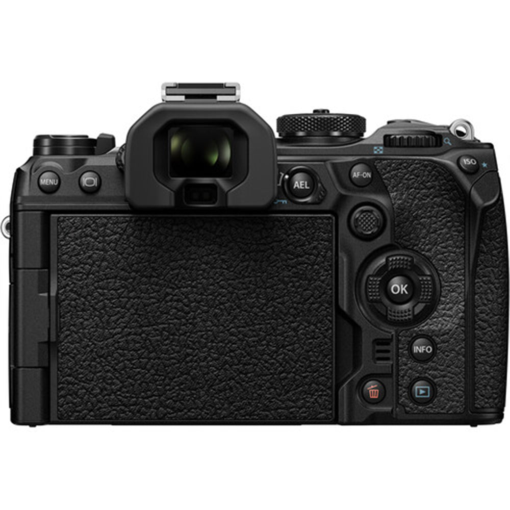 OM System OM-1 mirrorless camera with 20MP stacked BSI Live MOS sensor, TruePic X processor, paired with bright 12-40mm f/2.8 Pro II weather-sealed zoom lens, 5-axis IBIS, 4K 60p video, and fast autofocus.