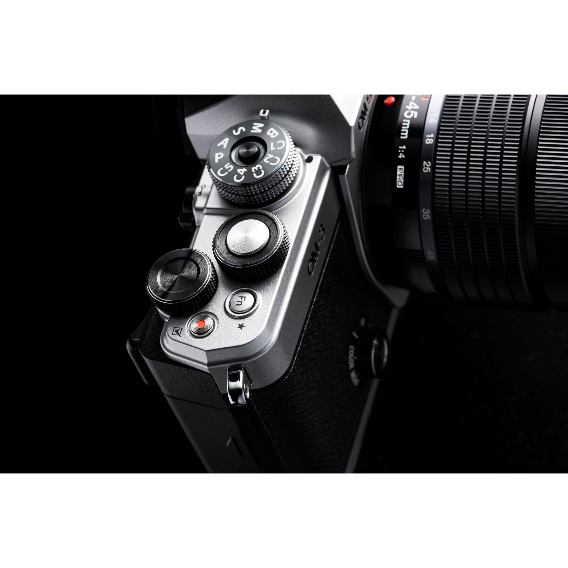 OM System OM-3 mirrorless camera with 20MP stacked BSI Live MOS sensor, TruePic X processor, 1053-point Quad Pixel AF covering 100% frame, up to 50 fps continuous AF burst, 4K 60p video, IP53 weather sealing, and 3-inch vari-angle touchscreen.