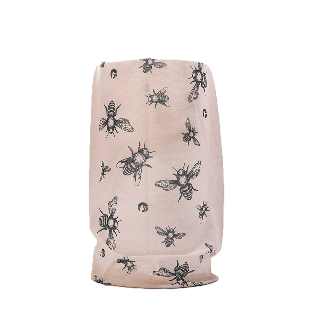 Beige fabric with black bee pattern on a white background