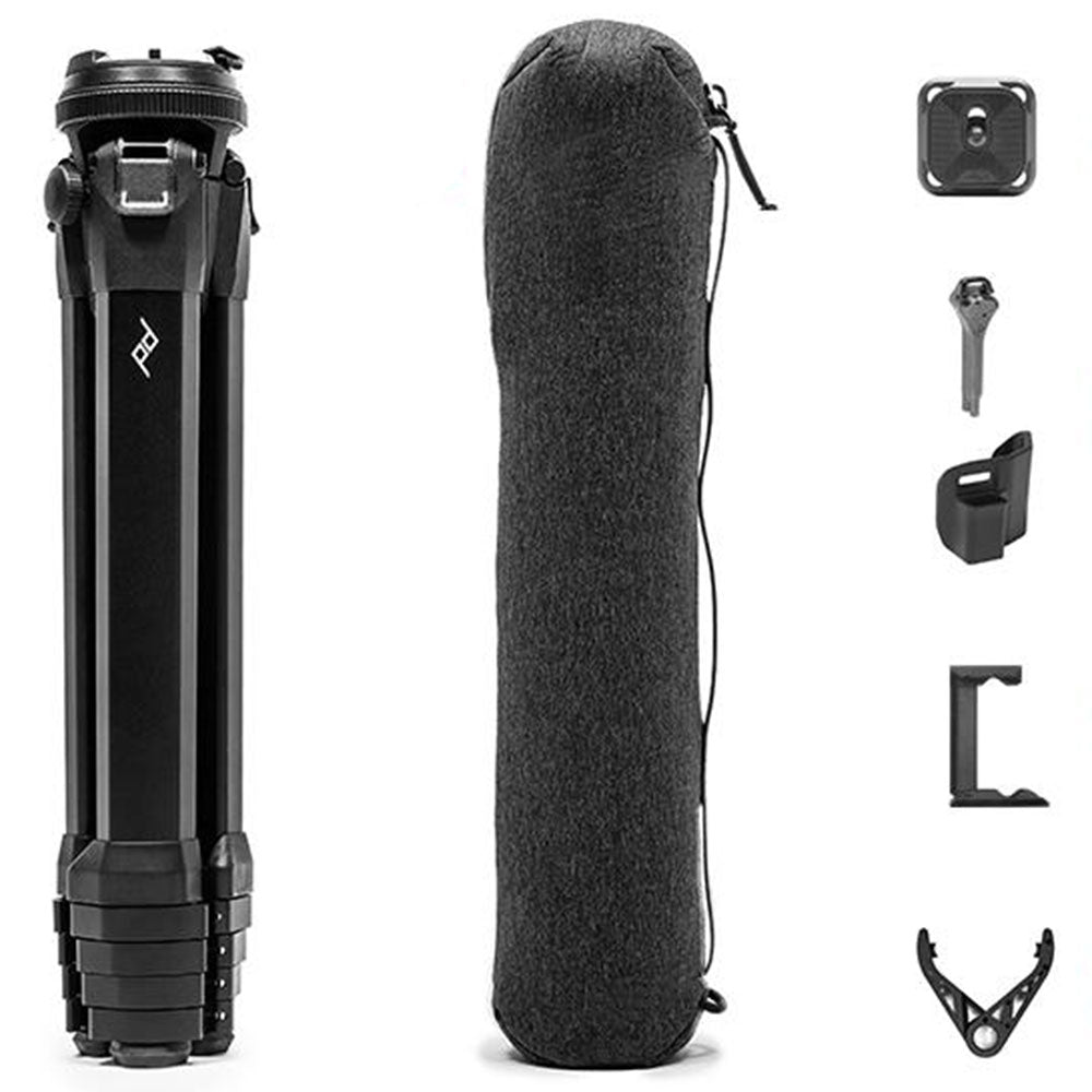 Camera tripod with carrying case and accessories on a white background