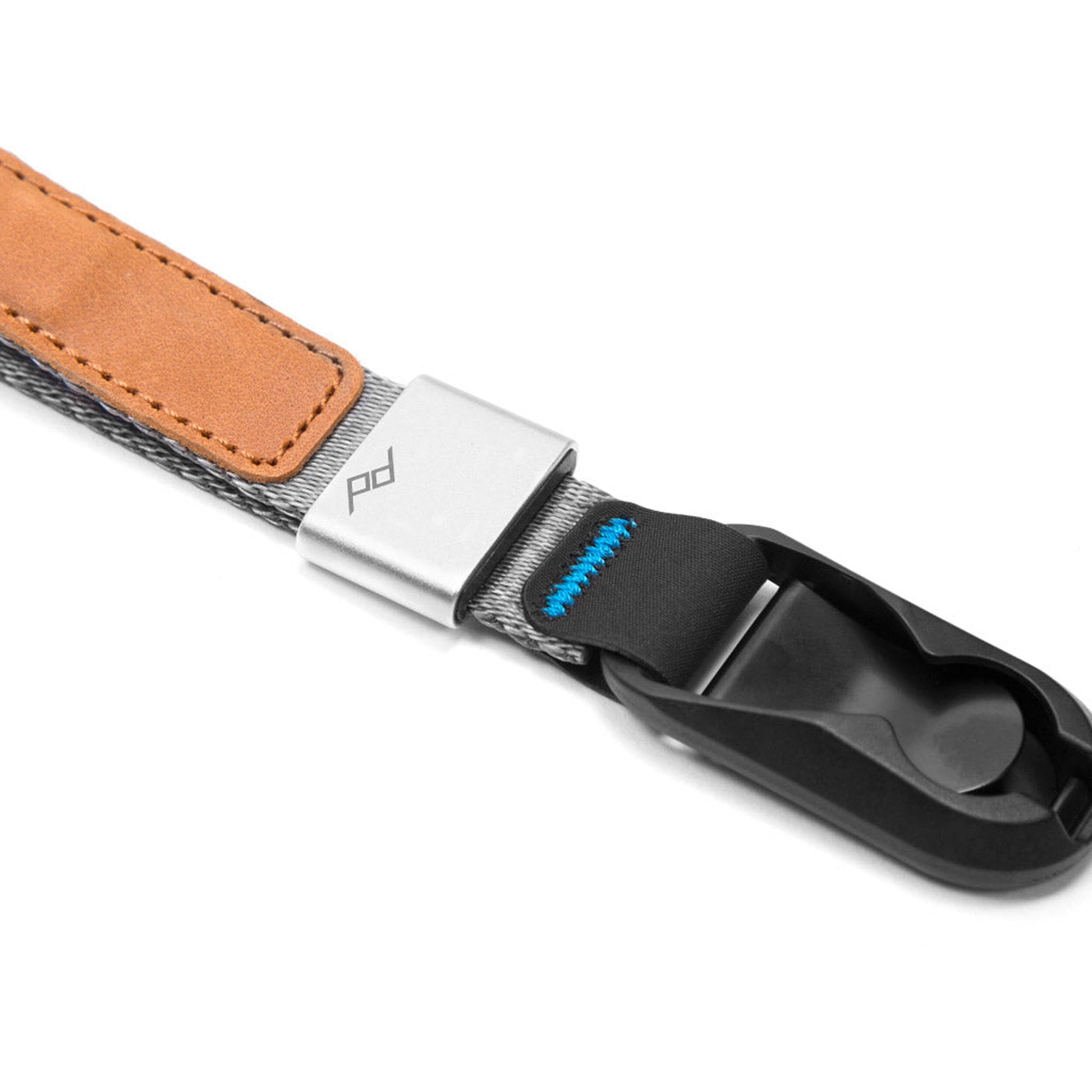 Secure your camera or binoculars with an adjustable wrist strap. This Peak Design Cuff is made from comfortable nylon webbing and trendy leather details.