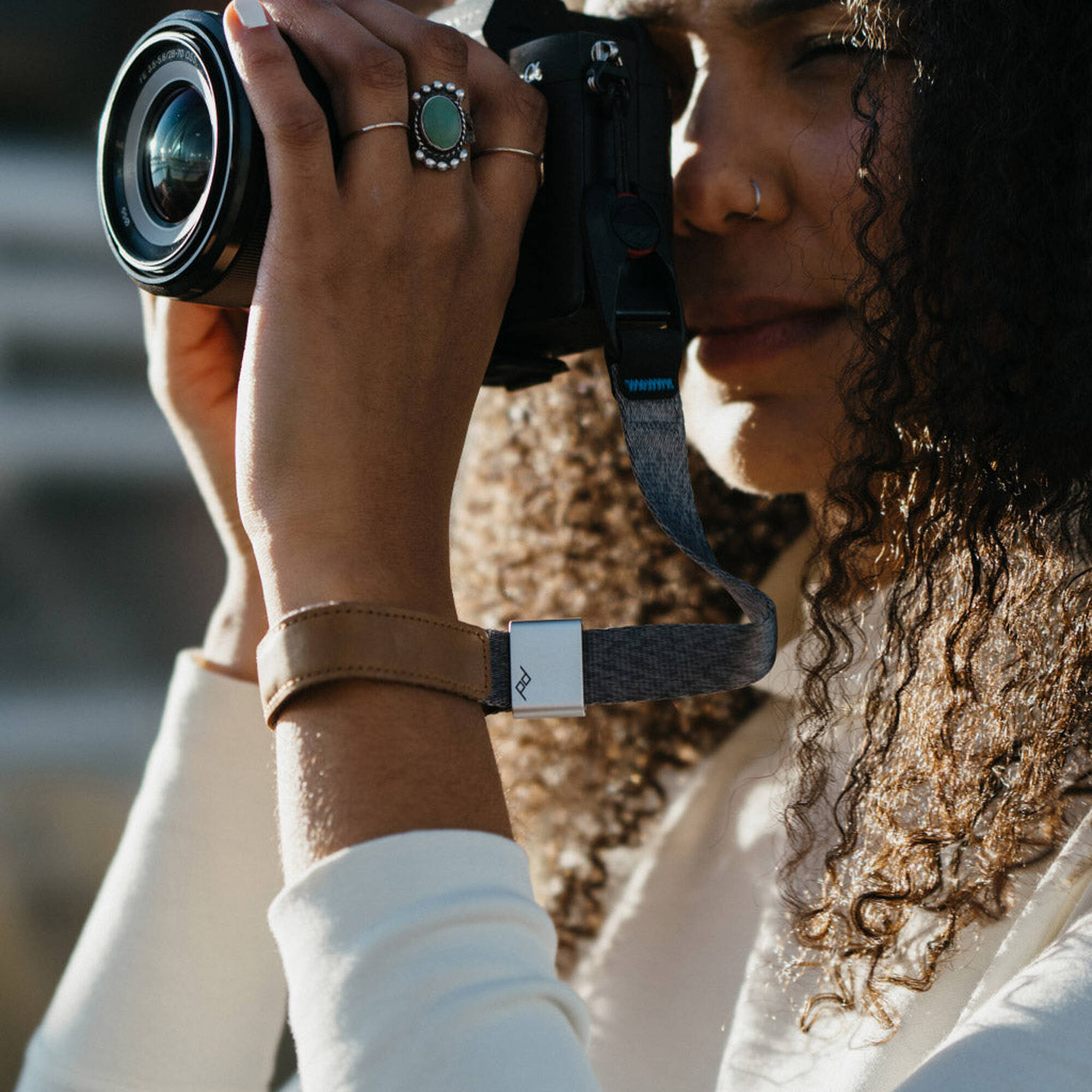 Secure your camera or binoculars with an adjustable wrist strap. This Peak Design Cuff is made from comfortable nylon webbing and trendy leather details.
