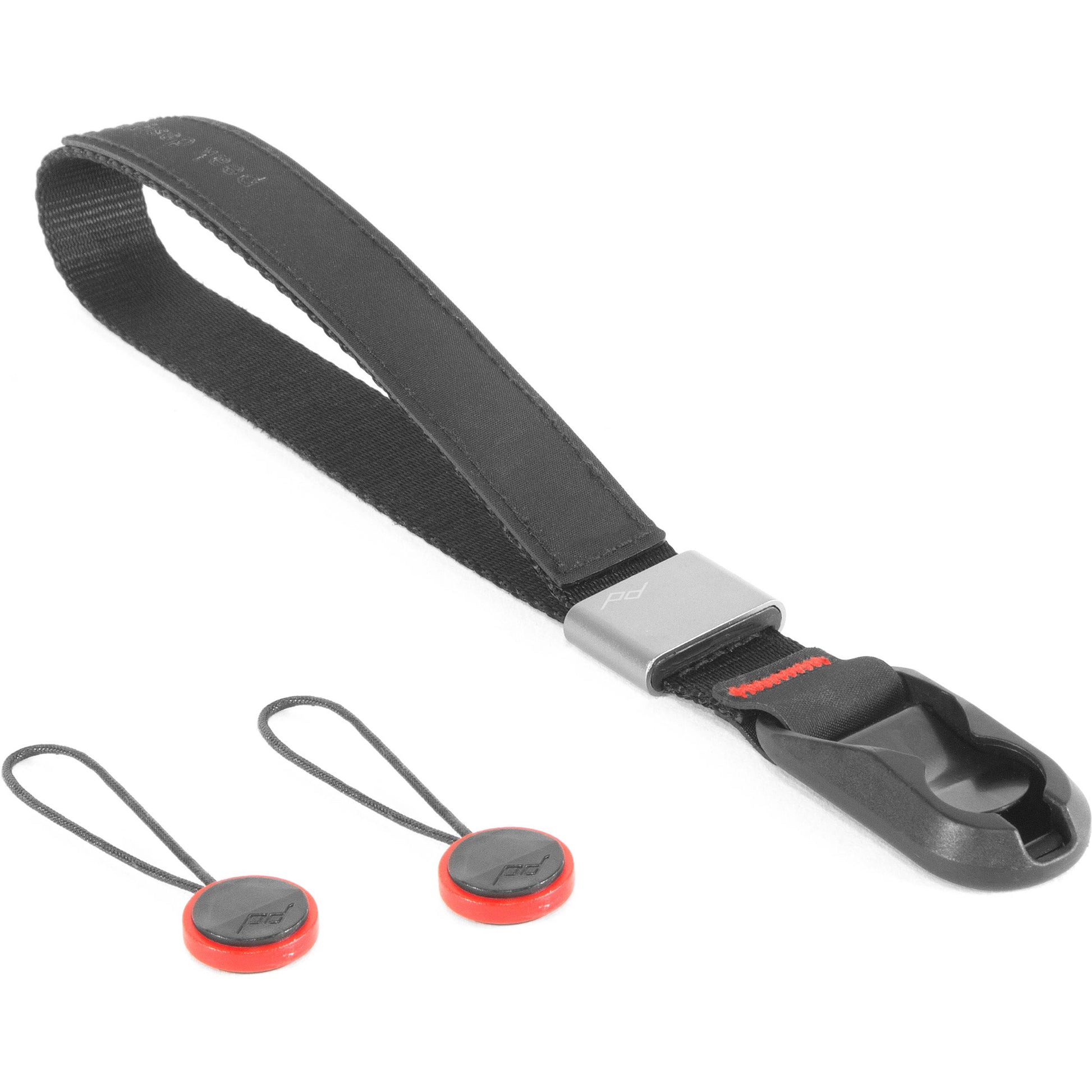 The wrist strap conveniently secures your camera or a pair of binoculars to an adjustable wrist strap.