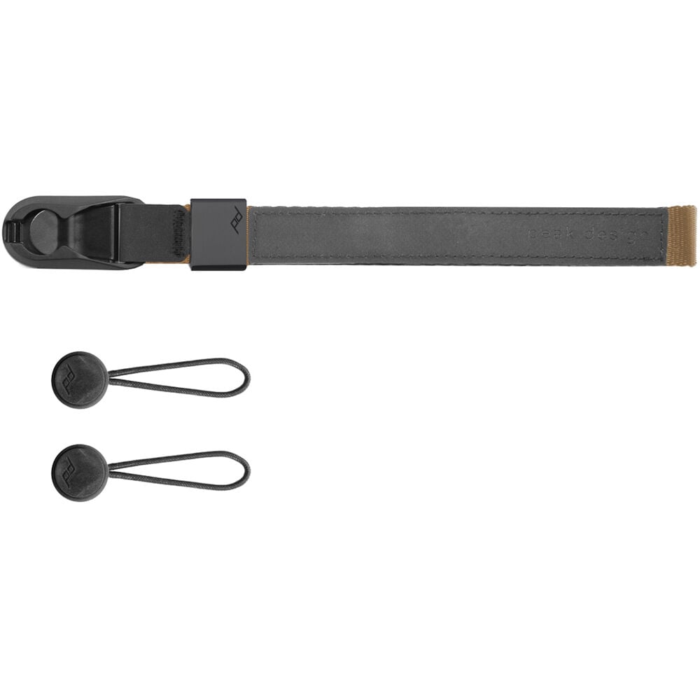 The Peak Design Cuff is a sleek, ultra-secure wrist strap with Dyneema-corded Anchors, holding over 90kg, perfect for protecting heavy cameras.