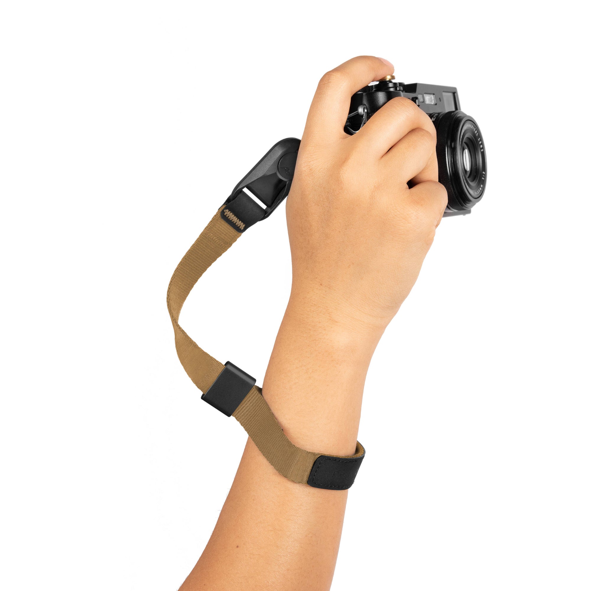 The Peak Design Cuff is a sleek, ultra-secure wrist strap with Dyneema-corded Anchors, holding over 90kg, perfect for protecting heavy cameras.