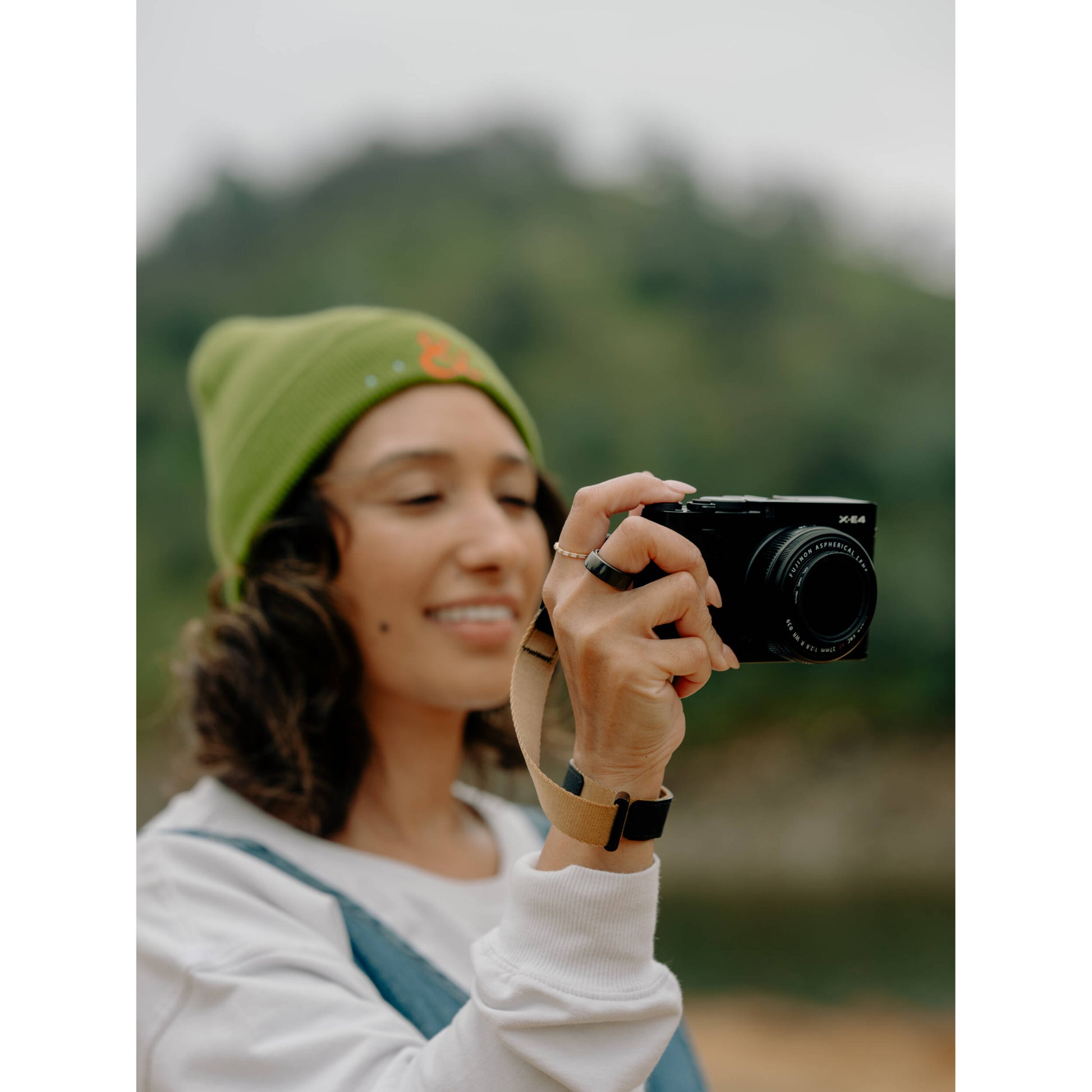 The Peak Design Cuff is a sleek, ultra-secure wrist strap with Dyneema-corded Anchors, holding over 90kg, perfect for protecting heavy cameras.