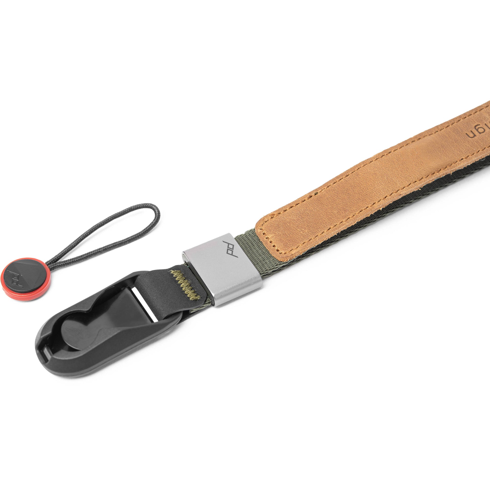 The Peak Design Cuff features a magnetic wrist loop that locks securely, offering a sleek, low-profile way to keep your camera safe from accidental falls.