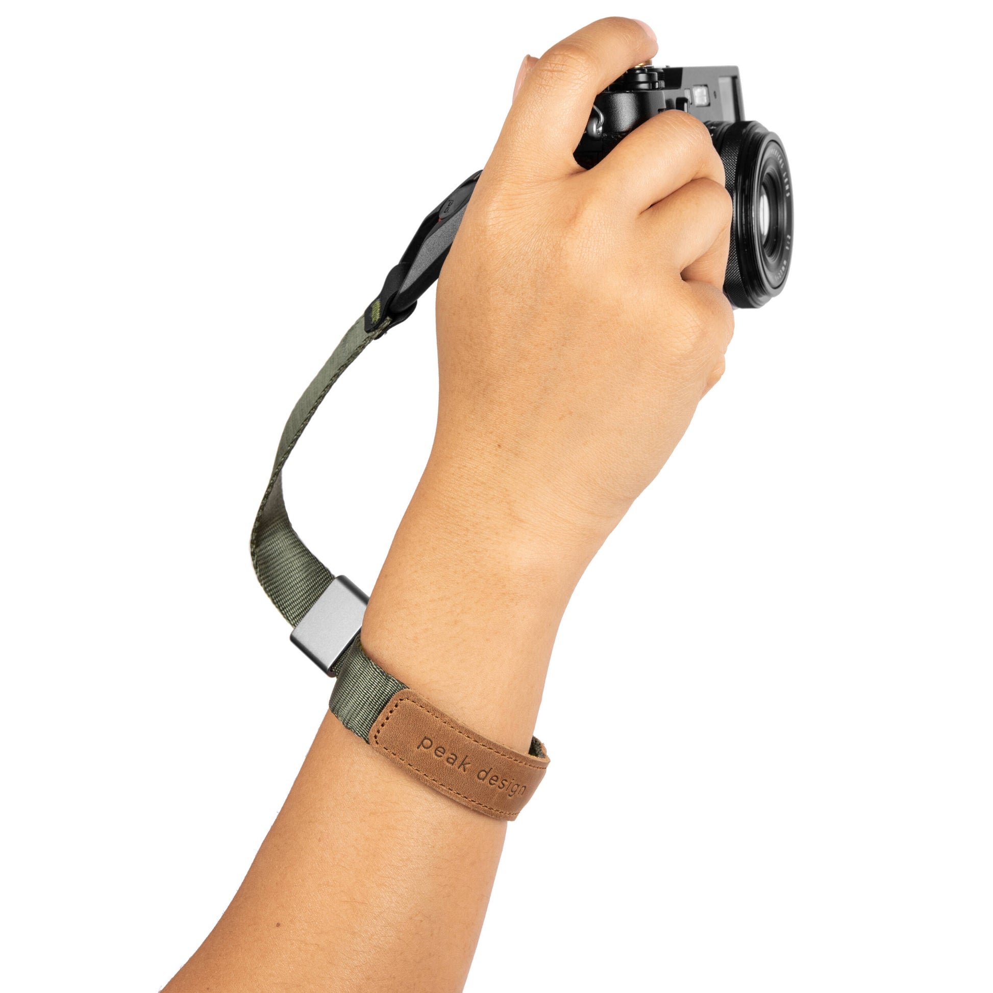 The Peak Design Cuff features a magnetic wrist loop that locks securely, offering a sleek, low-profile way to keep your camera safe from accidental falls.