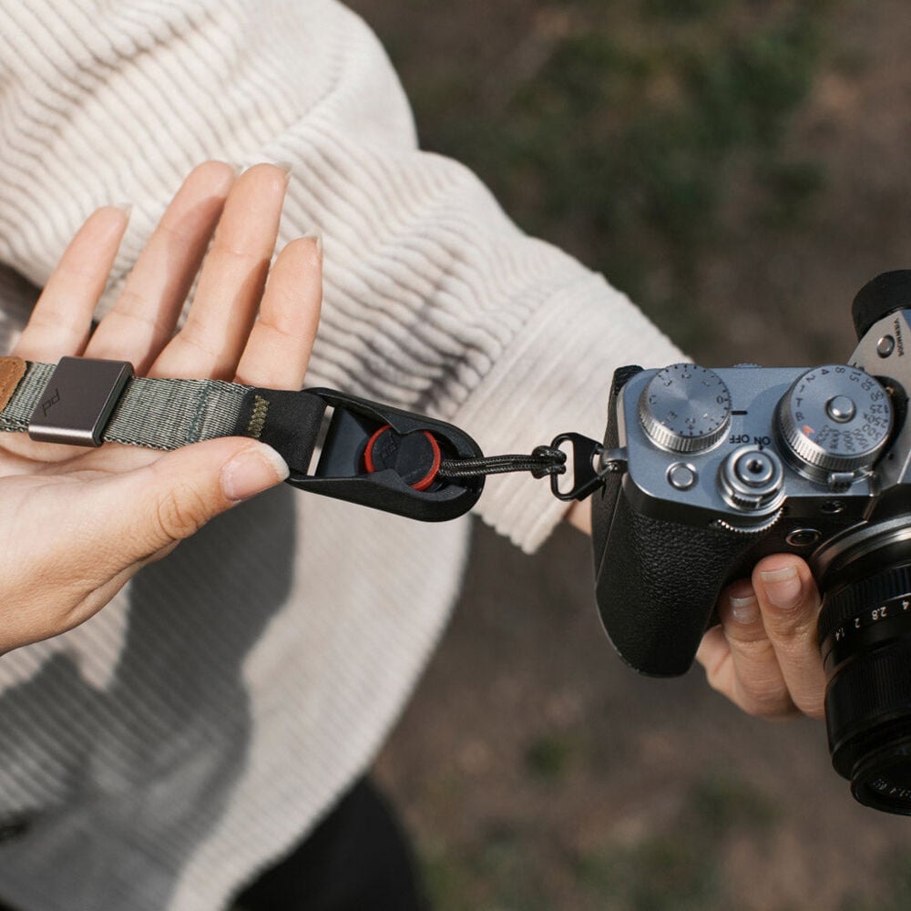 The Peak Design Cuff features a magnetic wrist loop that locks securely, offering a sleek, low-profile way to keep your camera safe from accidental falls.