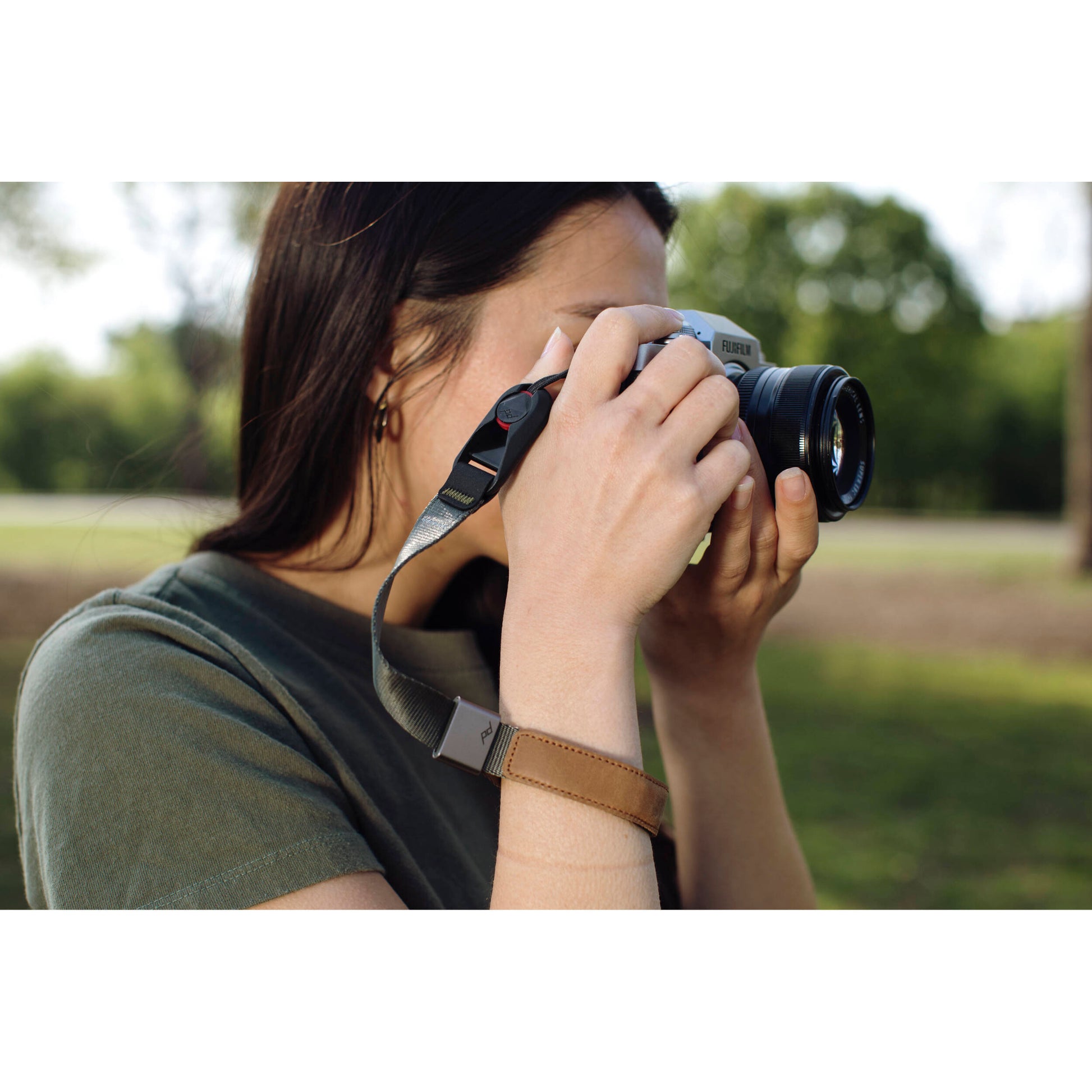 The Peak Design Cuff features a magnetic wrist loop that locks securely, offering a sleek, low-profile way to keep your camera safe from accidental falls.