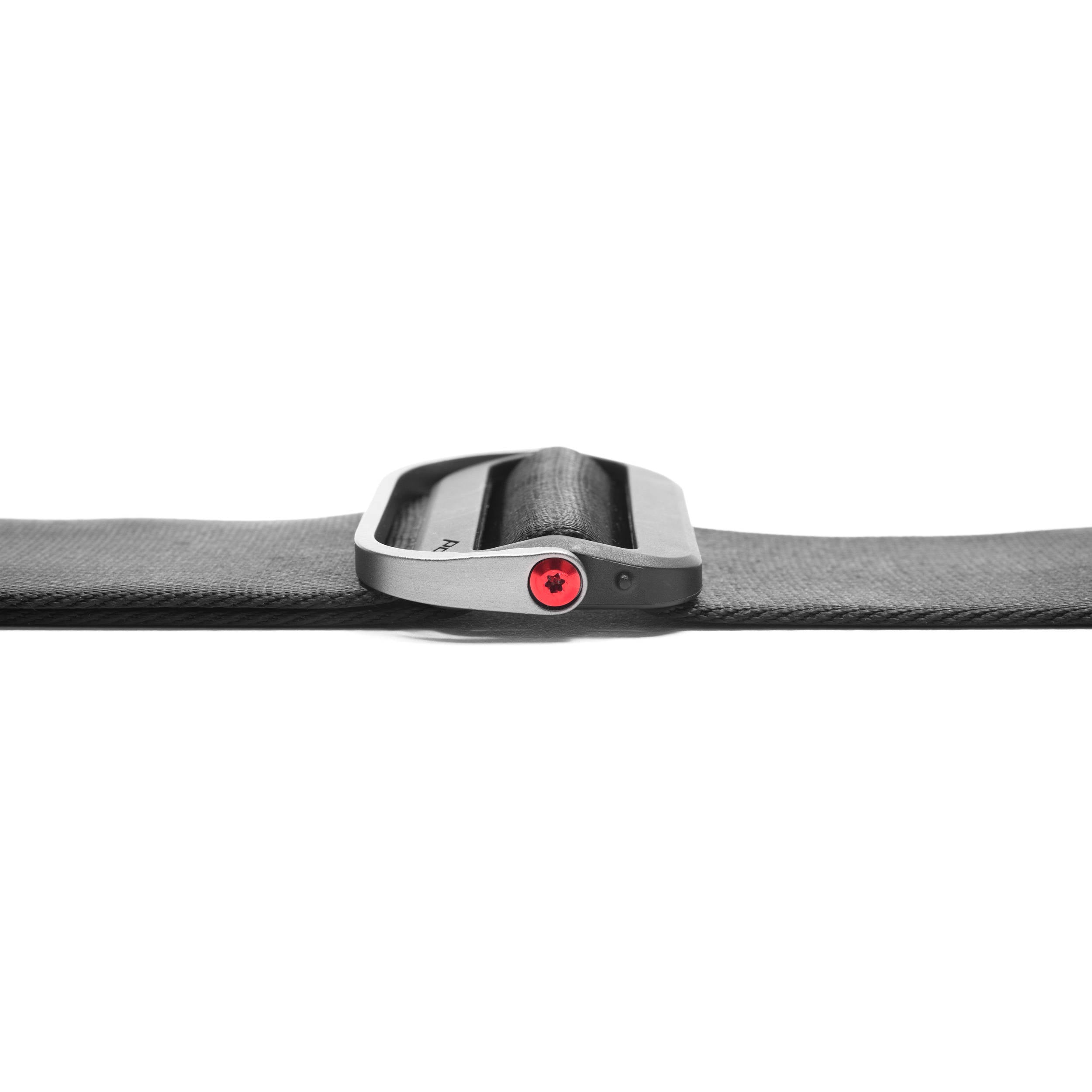 Peak Design Slide camera strap in Ash color, adjustable length 99-145 cm, 4.6 cm wide padded nylon webbing with smooth and grippy reversible sides, quick-connect Anchor Link system, supports up to 90 kg, usable as sling, neck, or shoulder strap.