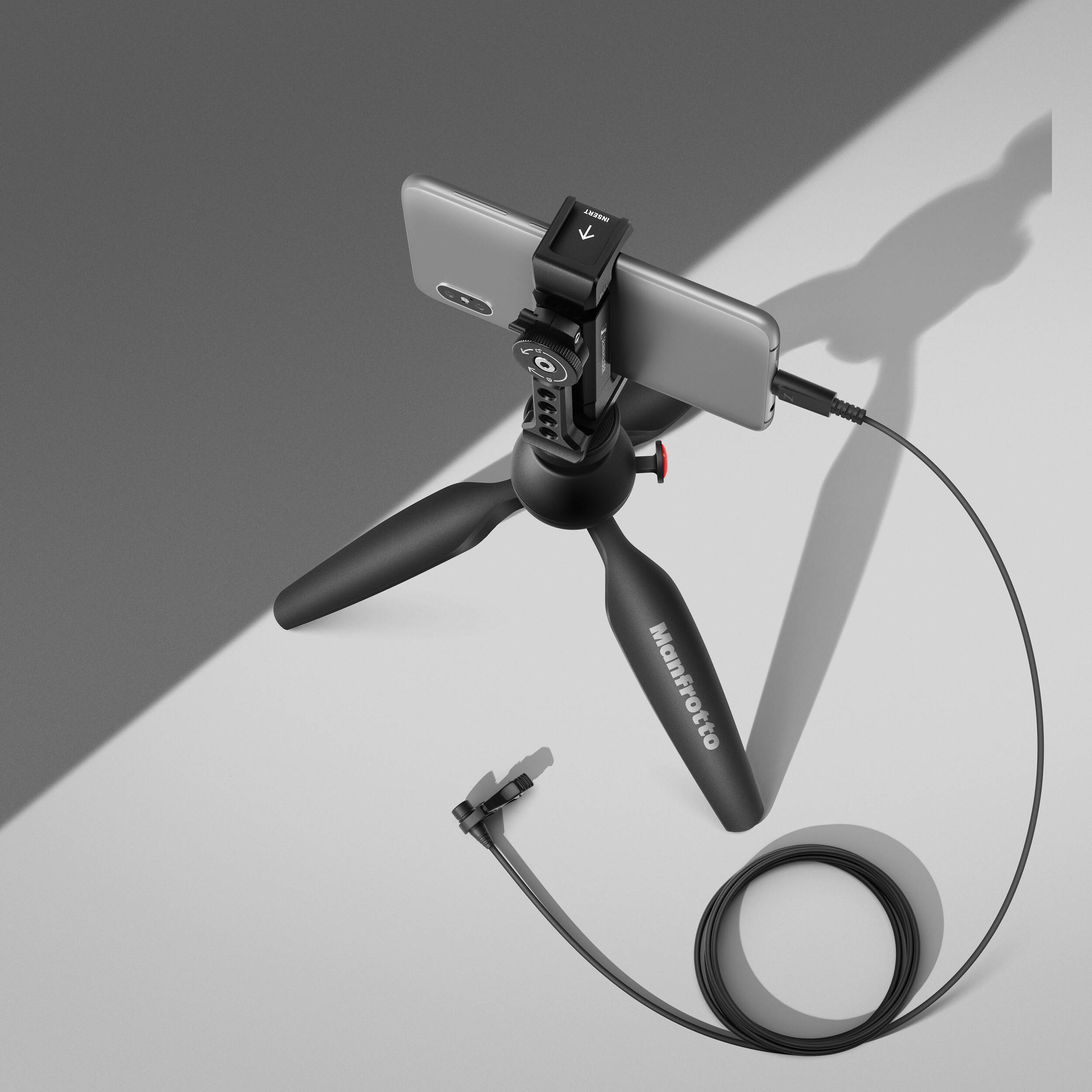Sennheiser XS Lav USB-C Mobile Kit including omnidirectional clip-on condenser microphone with 2m cable, USB-C connector, high-quality natural sound, smartphone clamp with cold shoe mount, and Manfrotto PIXI mini tripod for versatile mobile content creation.