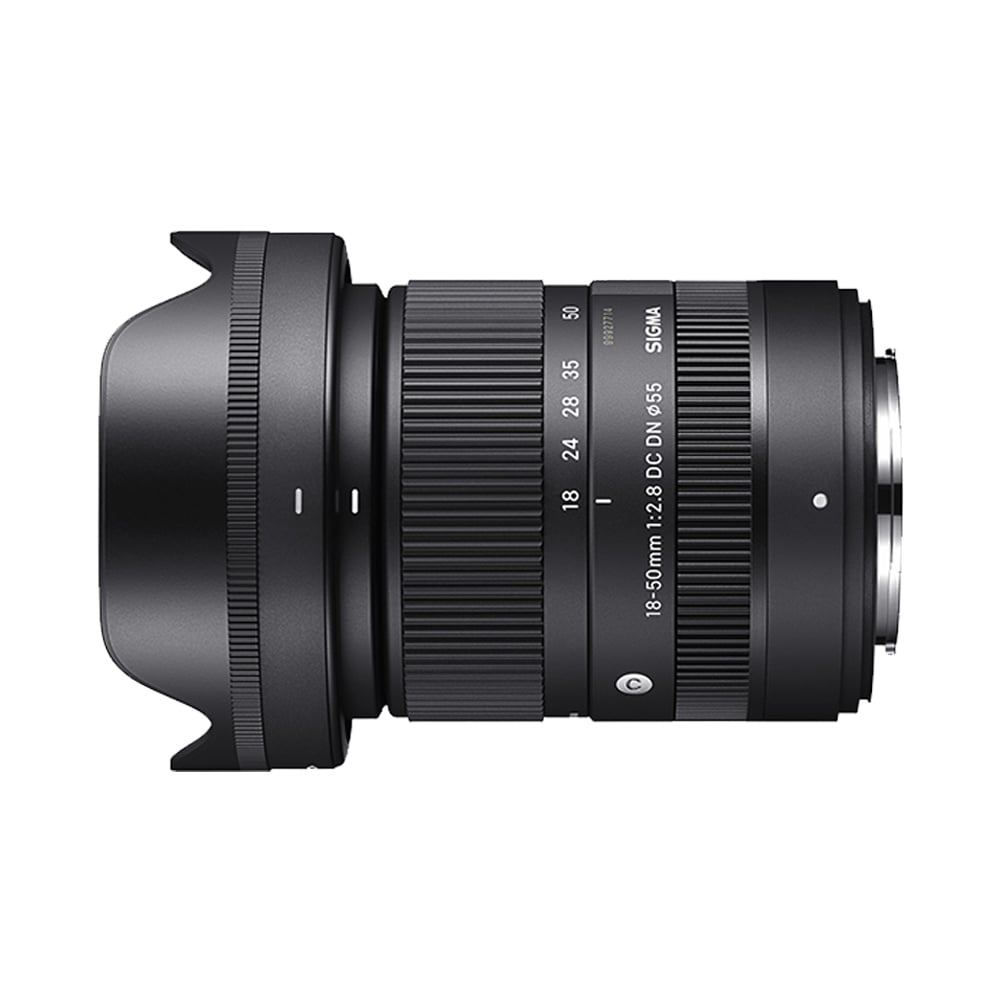 Camera lens with Sigma branding on a white background