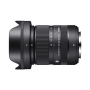 Camera lens with Sigma branding on a white background