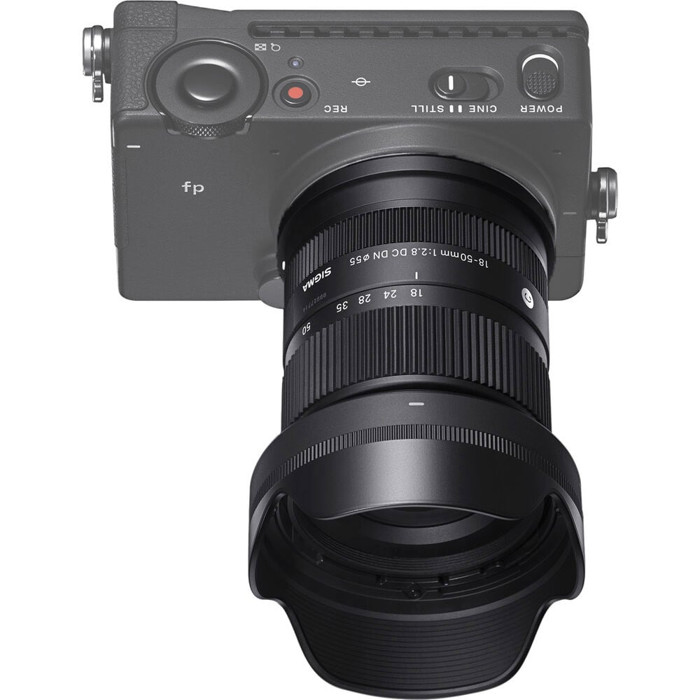 Camera with lens on a white background